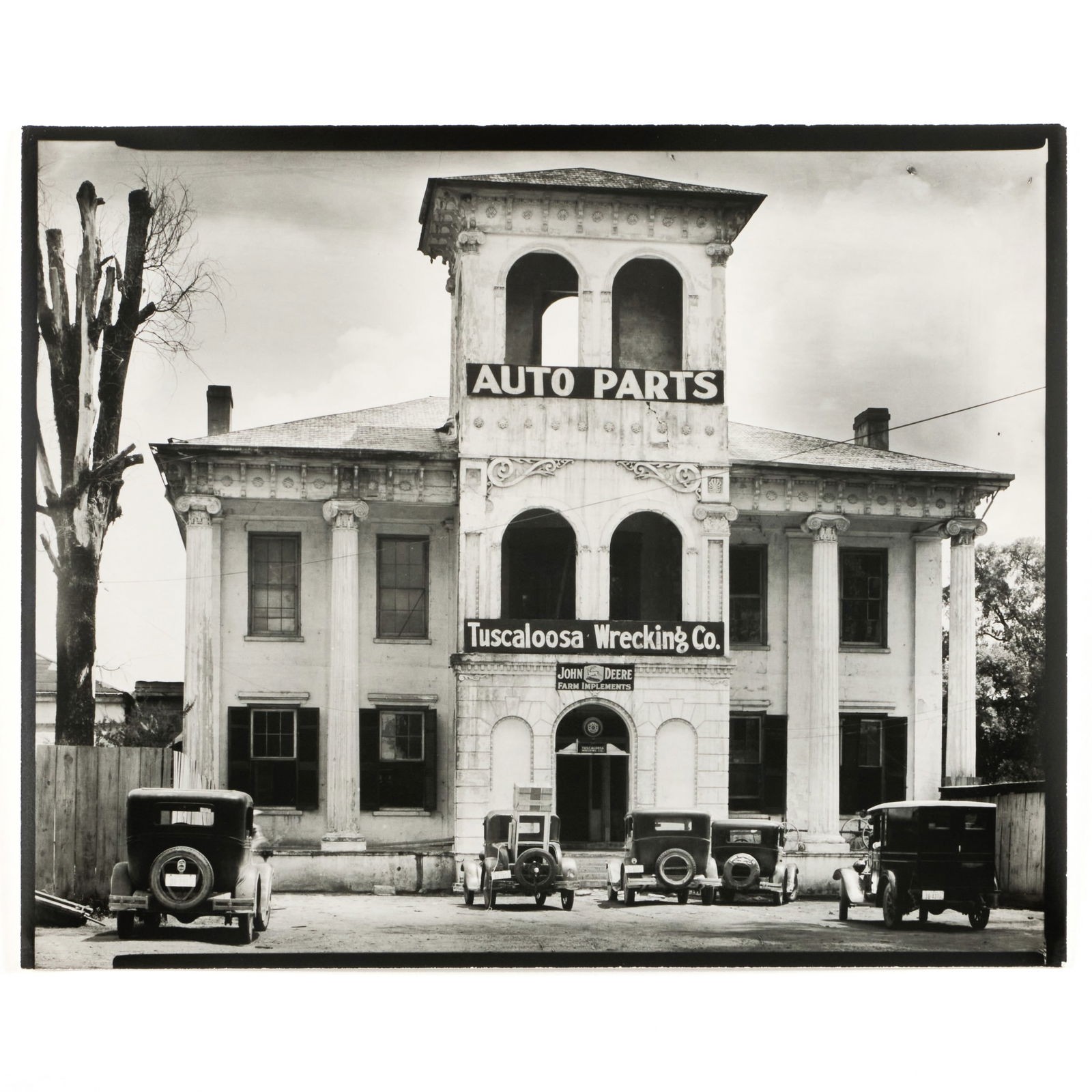 Walker Evans (1903-1975): Tuscaloosa Wrecking Company, Alabama: Walker Evans (1903-1975): Tuscaloosa Wrecking Company, Alabama Gelatin silver print, 1936, printed c. 1970 by James Dow, unsigned, variously inscribed in another hand on the reverse. 8 x 9 7/8 in. (sh