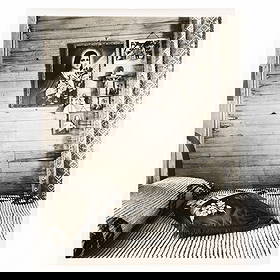 Walker Evans (1903-1975): Bedroom, Shrimp Fisherman's House, Biloxi, Mississippi: Walker Evans (1903-1975): Bedroom, Shrimp Fisherman's House, Biloxi, Mississippi Gelatin silver print, 1945, printed c. 1970 by James Dow, unsigned, variously inscribed in another hand on the reverse.