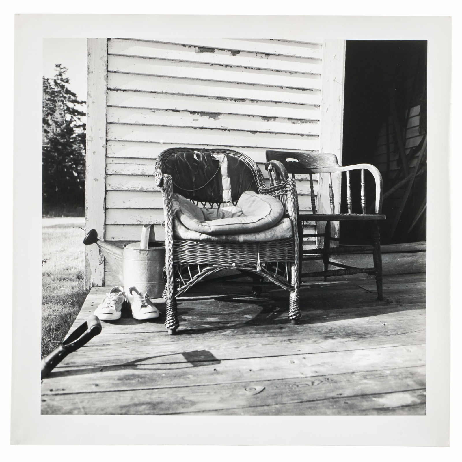 Walker Evans (1903-1975): Untitled (Two Wicker Chairs with Sneakers): Walker Evans (1903-1975): Untitled (Two Wicker Chairs with Sneakers) Gelatin silver print, 1962, printed c. 1970 by James Dow, unsigned, variously inscribed in another hand on the reverse. 10 7/8 x 11