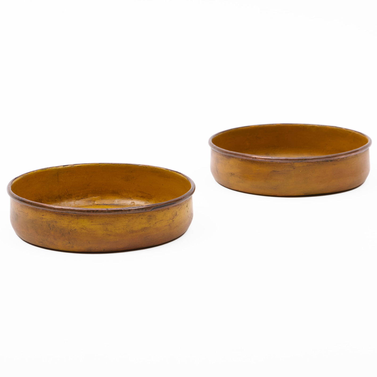 Pair of Yellow Tole Bottle Coasters: Pair of Yellow Tole Bottle Coasters 1 1/4 x 5 1/4 in. diam. The Collection of James M. Labaugh Antiques, Pound Ridge, NY.