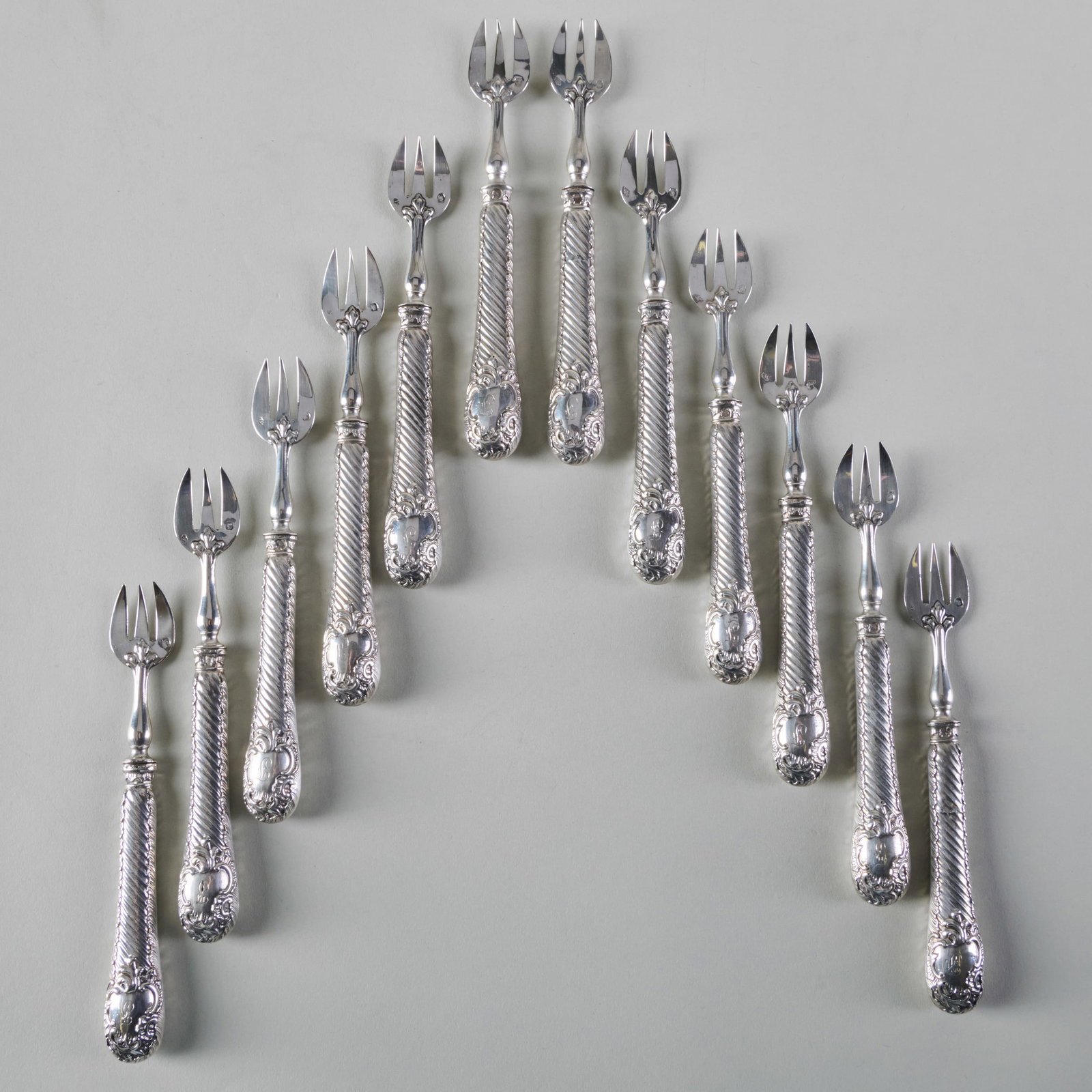 Set of Twelve French Silver Shellfish Forks: Set of Twelve French Silver Shellfish Forks Marked ',800', monogrammed with filled handles. 6 in. long.