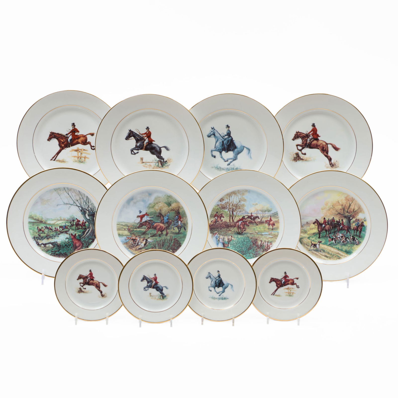 The Huntsman Porcelain Equestrian Part Service: The Huntsman Porcelain Equestrian Part Service Black printed mark. Comprising: Four side plates Eight dinner plates The side plates 6 3/8 in. diam., the dinner plates 10 1/2 in. diam., (12 pcs).