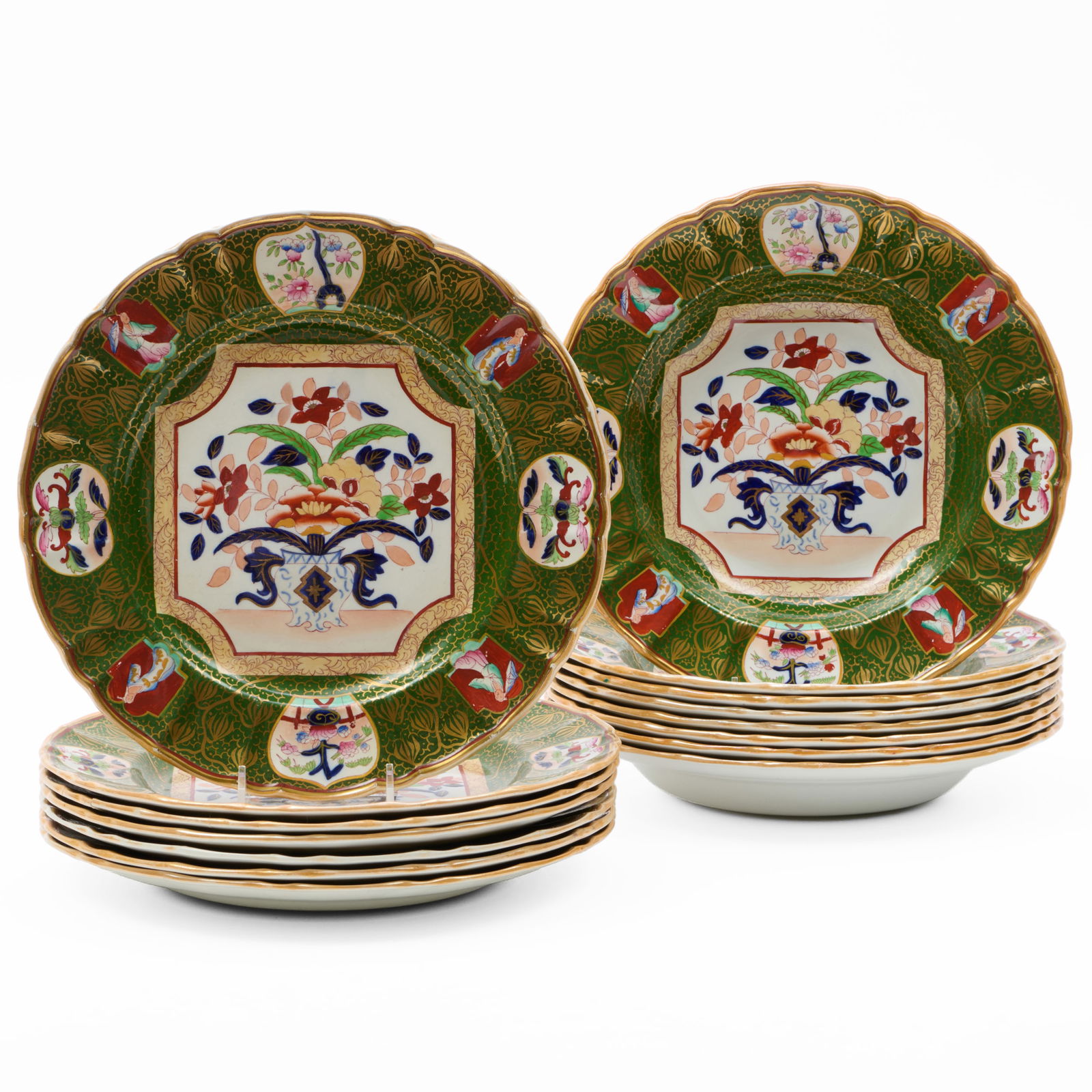 Set of Ashworth's Ironstone Green Ground Plates and Soup Plates: Set of Ashworth's Ironstone Green Ground Plates and Soup Plates Printed mark. Comprising: Six dinner plates Eight soup plates The dinner plates 10 1/4 in. diam., (14 pcs).