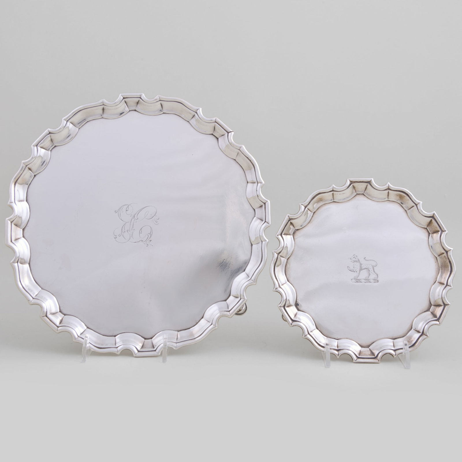 George II Silver Salver and a Waiter: George II Silver Salver and a Waiter The salver mark of George Hindmarsh, London, 1737, monogrammed; the waiter mark of George Hindmarsh, London, 1738, and a French import mark, engraved with crest. T