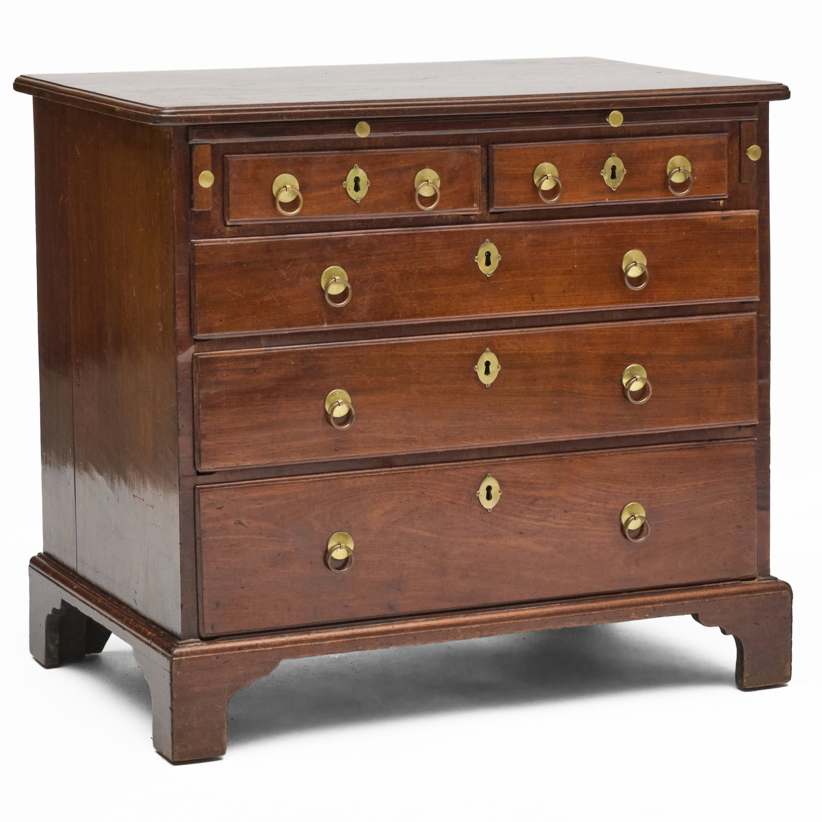 George I Mahogany Bachelor's Chest: George I Mahogany Bachelor's ChestFitted with a brush slide. 29 1/2 x 32 x 21 in. W.M. Schwind, Jr. Antiques & Fine Art, Yarmouth, ME, November 29, 1994.Collection of Susan and Alan Miller, NY.