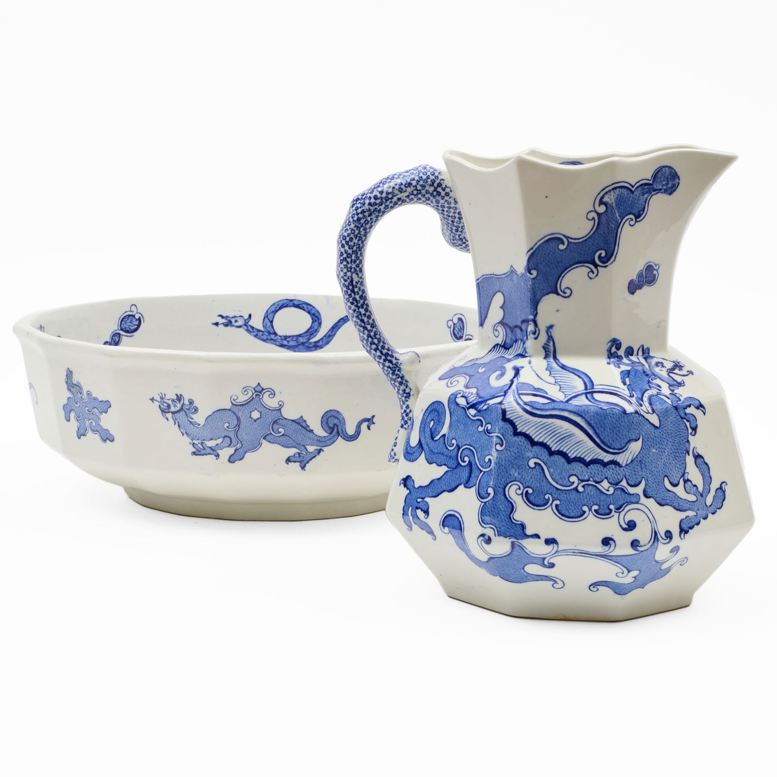 Mason's Ironstone Basin and Pitcher: Mason's Ironstone Basin and PitcherBlue printed mark.The pitcher 11 1/2 x 10 x 8 1/2 in., the basin 5 1/2 x 16 in. diam.Collection of Susan and Alan Miller, NY.