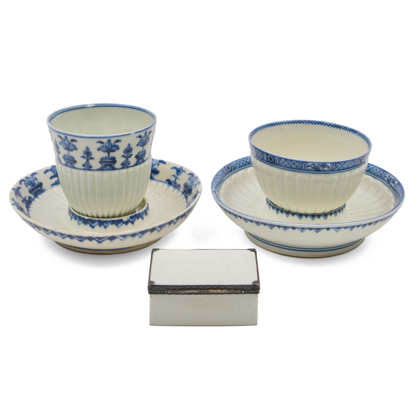 Two St. Cloud Porcelain Cups and Saucers and a Mennecy Snuff Box: Two St. Cloud Porcelain Cups and Saucers and a Mennecy Snuff Box Each unmarked. The cups comprising: A teabowl and saucer A teacup and saucer The larger 3 1/2 x 5 1/2 in. diam., (3 pcs). Each with app