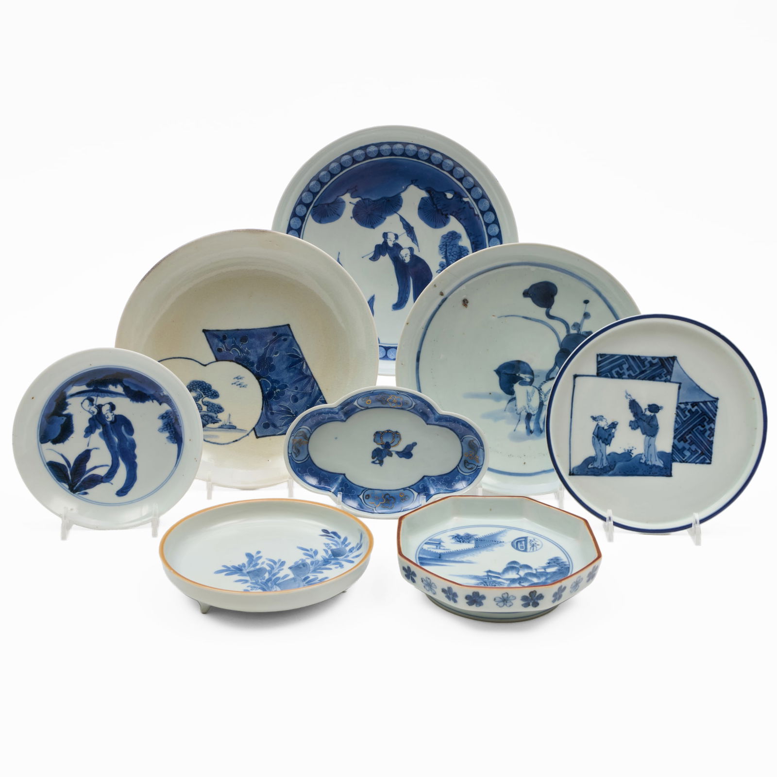 Group of Two Japanese Porcelain Plates and Five Dishes: Group of Two Japanese Porcelain Plates and Five Dishes Comprising: A plate with egrets, blue fret mark within a circle A plate with two figures, blue circle A shallow saucer dish, blue circle A dish w