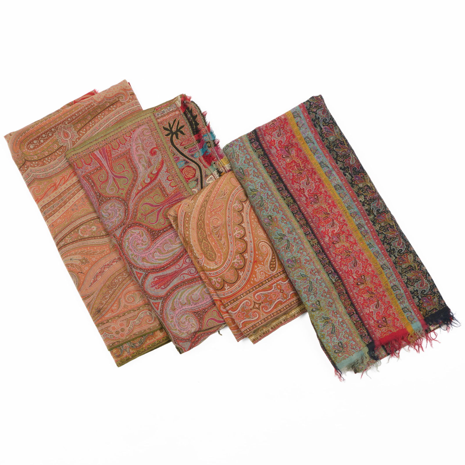 Group of Four Kashmir Paisley Shawls and Textiles: Group of Four Kashmir Paisley Shawls and Textiles 10 ft. 9 x 5 ft., 10 ft. 8 x 4 ft. 5 in., 6 ft. x 6 ft., 9 ft. 9 x 4 ft. 7 in. Collection of Susan and Alan Miller, NY.