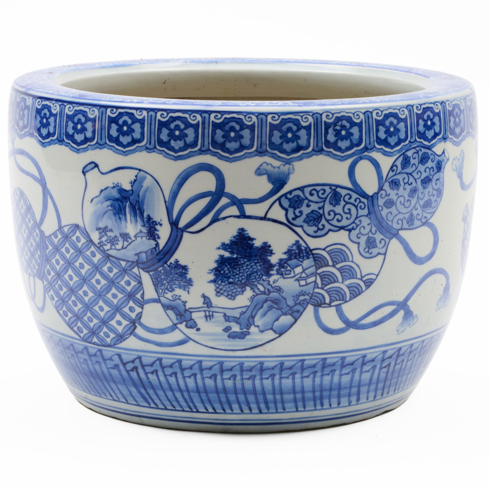 Japanese Blue and White Porcelain Jardiniere: Japanese Blue and White Porcelain Jardiniere Unmarked. 10 1/2 x 15 in. diam. W.M. Schwind Jr. Antiques & Art, Yarmouth, ME, 1996. Collection of Susan and Alan Miller, NY.