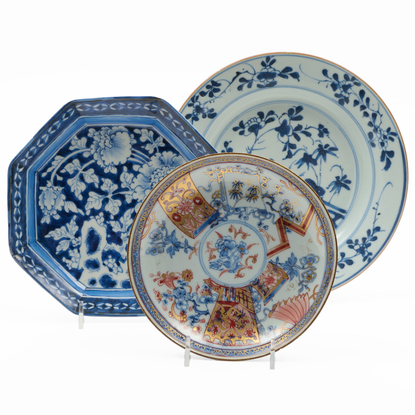 Two Chinese Porcelain Dishes and a Plate: Two Chinese Porcelain Dishes and a Plate Comprising: A gilt-decorated blue, red and white saucer dish, unmarked An octagonal dish, unmarked A blue and white plate, unmarked The plate 9 in. diam. The s