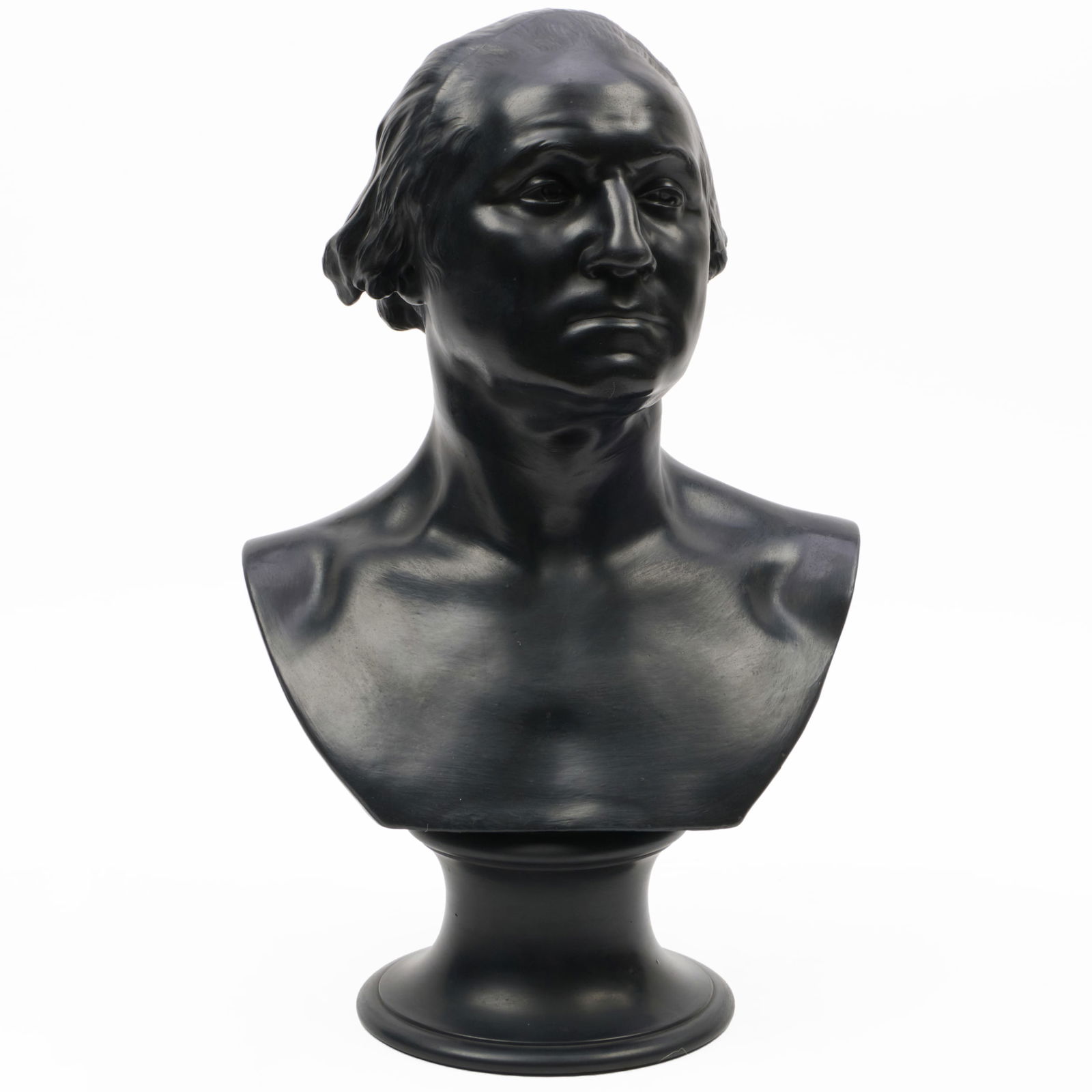 Wedgwood Basalt Bust of George Washington: Wedgwood Basalt Bust of George WashingtonImpressed lowercase mark.18 x 12 1/2 x 7 1/2 in.Note: After a portrait by Jean-Antoine Houdon (1785–1786), this representation is believed to be one of the
