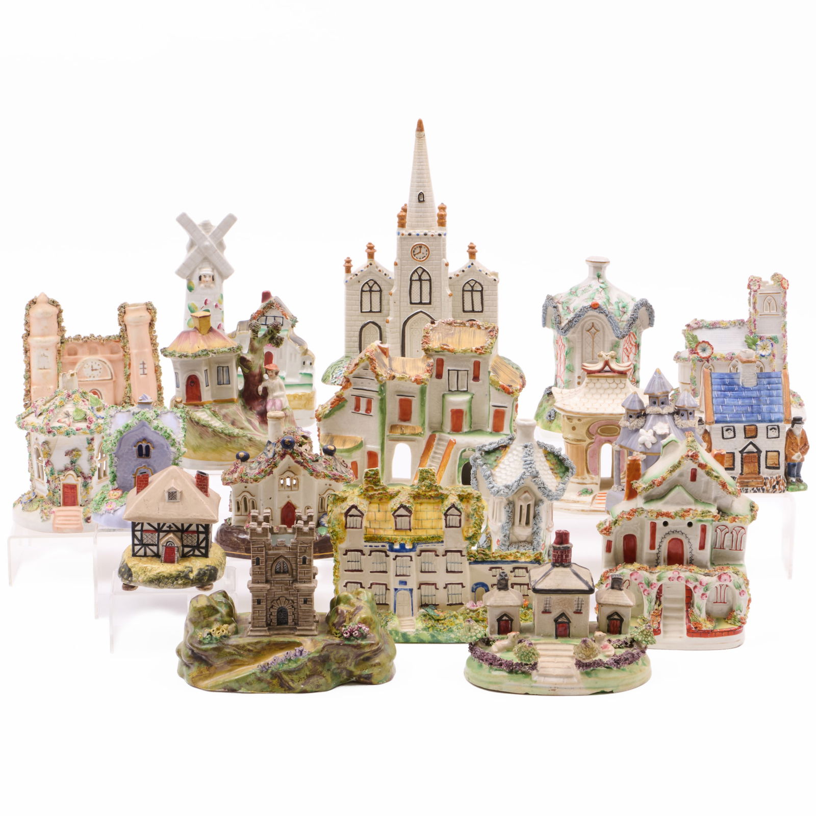 Group of Seventeen Staffordshire Pastille Burners and Models of Houses: Group of Seventeen Staffordshire Pastille Burners and Models of HousesComprising:Nine pastille burners of various sizesEight models of houses and castlesTogether with:A Pratt type model of a churchA