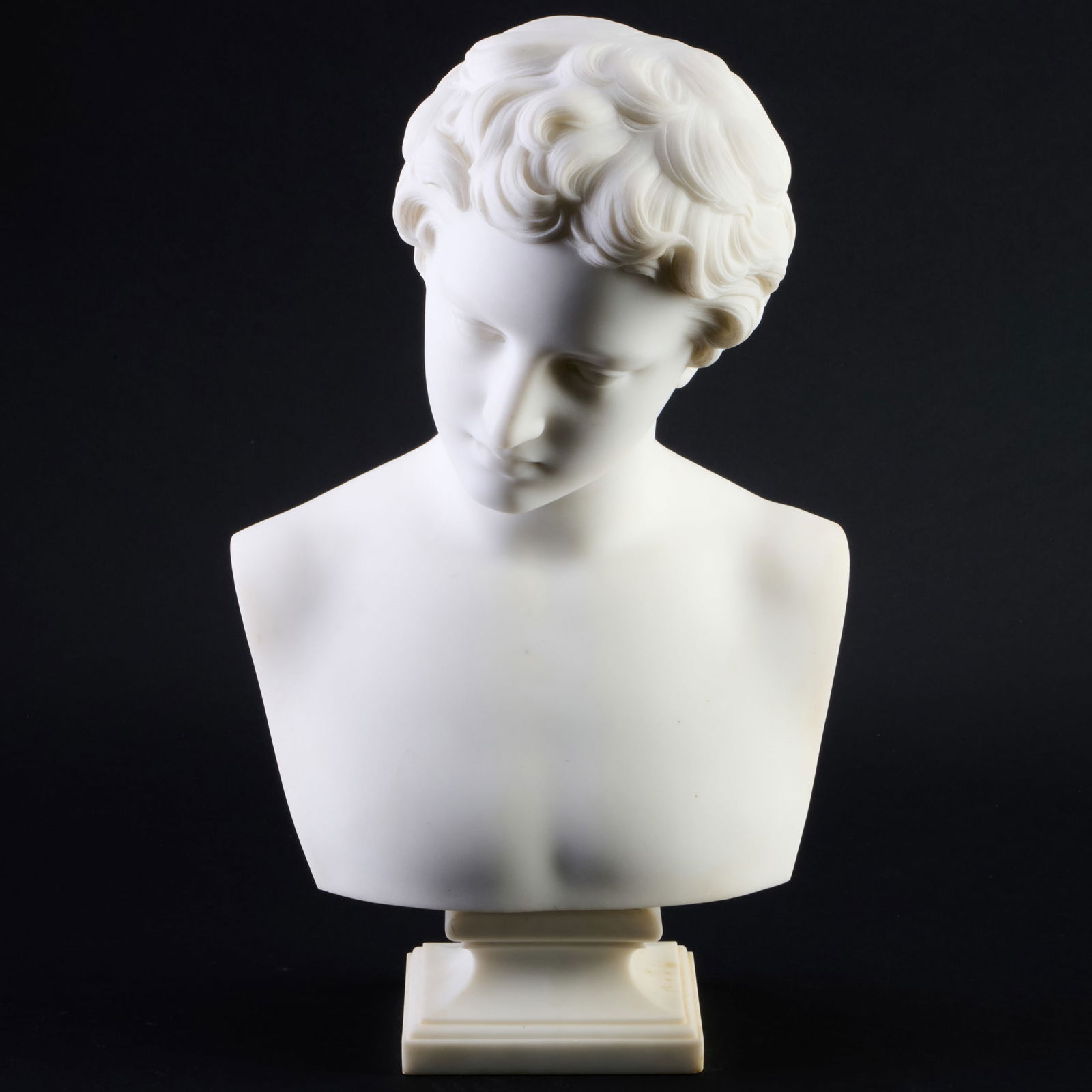 Hiram Powers (1805-1873): Fisher Boy: Hiram Powers (1805-1873): Fisher BoyWhite marble on a white stone base, signed 'H. Powers.' and inscribed 'Sculp' on the reverse. 19 x 11 1/2 x 9 1/2 in.Literature: Wunder, Richard P., Hiram Powers: