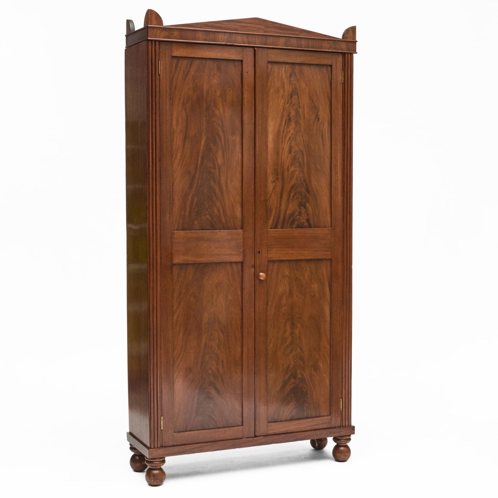 Classical Mahogany Blind Door Bookcase, Baltimore: Classical Mahogany Blind Door Bookcase, Baltimore In two parts and fitted with five shelves. 89 x 43 1/2 x 18 3/4 in.Didier, Inc., New Orleans. 