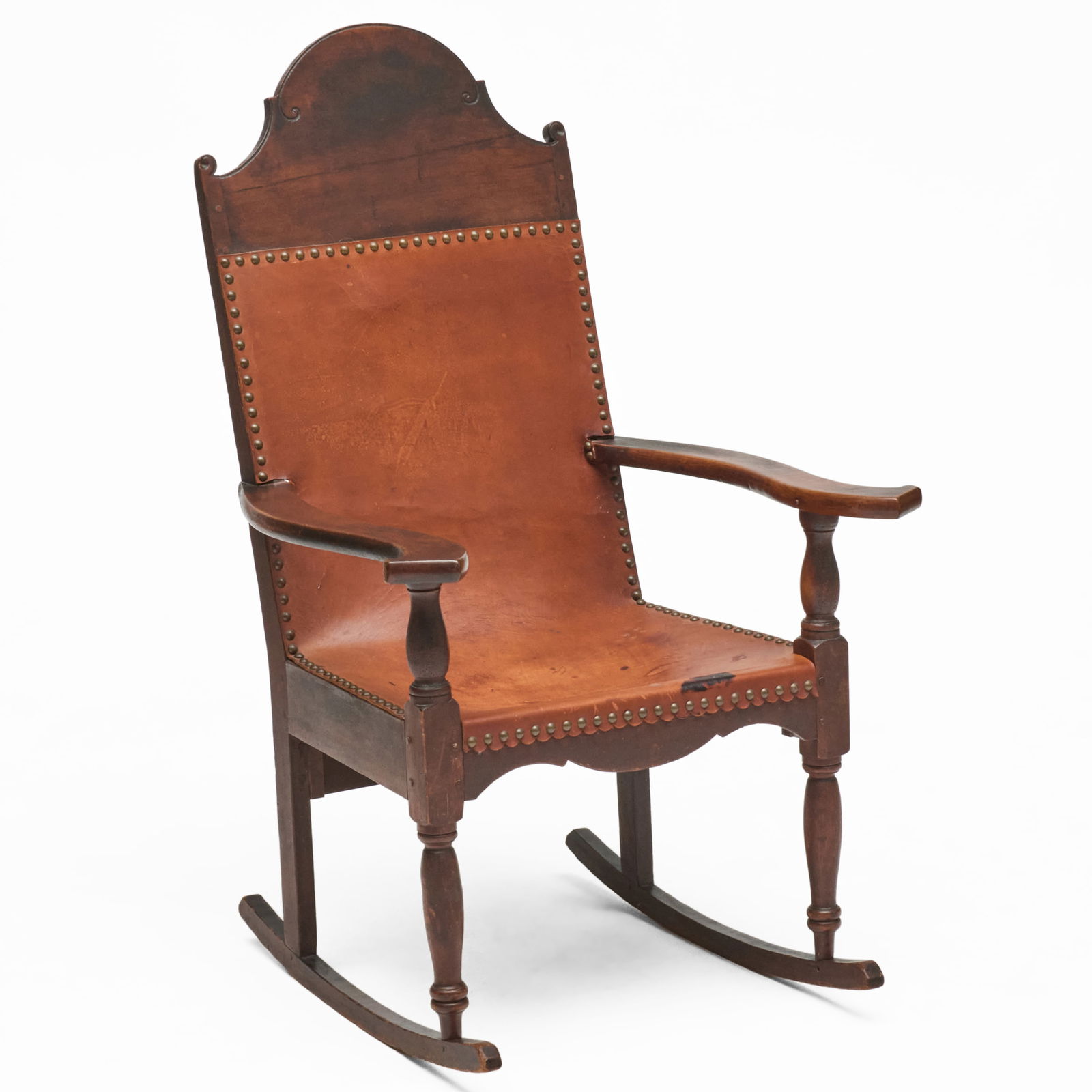 Federal Cherry and Leather Butaca Rocker, New Orleans: Federal Cherry and Leather Butaca Rocker, New Orleans Fitted with later close-nailed leather upholstery. 41 1/2 x 25 3/4 x 27 in. Didier, Inc., New Orleans, 1994.