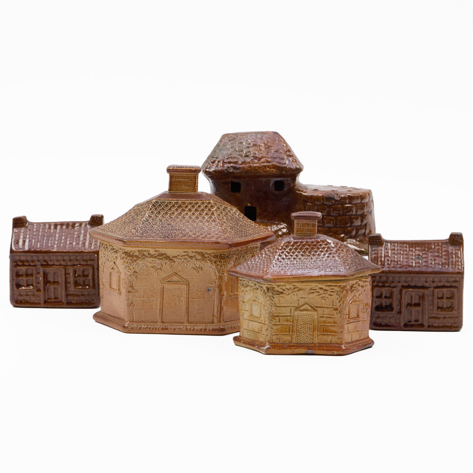 Group of Four Staffordshire House Form Banks and a Box: Group of Four Staffordshire House Form Banks and a Box Unmarked. 5 x 7 1/4 x 4 in. The Miller Family Collection, Pittsfield, MA.