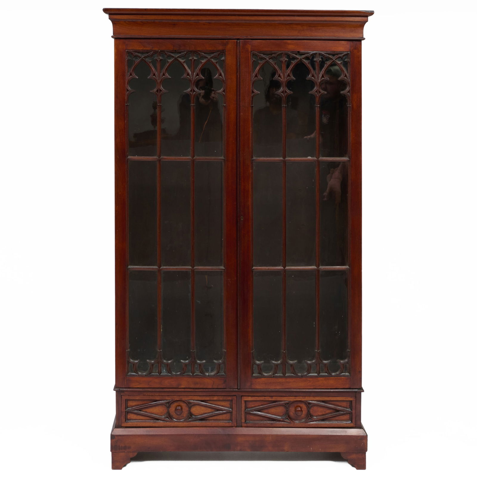 Gothic Revival Walnut Bookcase: Gothic Revival Walnut BookcaseFitted with five shelves and two lower drawers.6 ft. 4 in. x 44 1/4 x 14 1/2 in. Mark B. Bieluczyk, Woodbury, CT.Collection of Beverly & Richard Kelly.