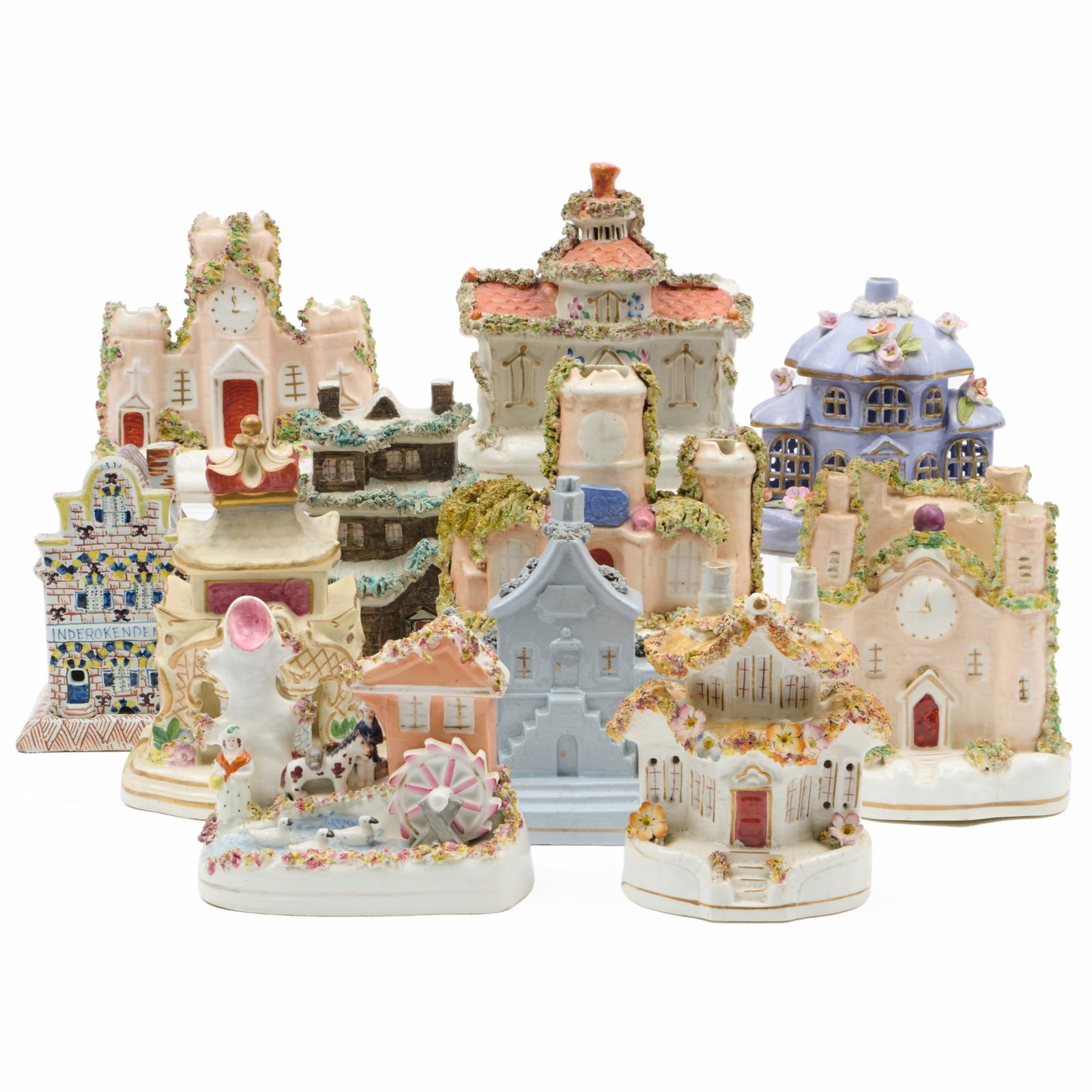 Group of Nine Staffordshire Pastille Burners and Models of Houses: Group of Nine Staffordshire Pastille Burners and Models of HousesUnmarked.Together with a Delft pastille burner and a Staffordshire model of a millThe largest 7 x 5 x 2 1/4 in., (11 pcs).The Miller