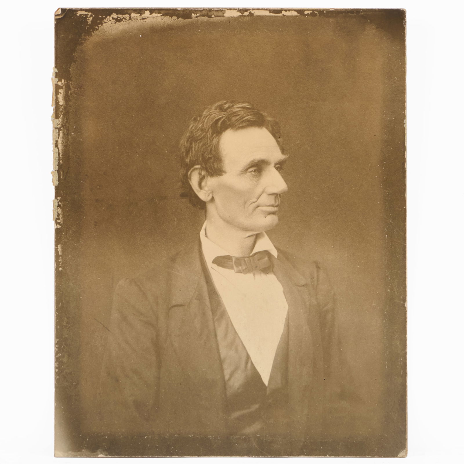 Attributed to Alexander Hesler (1829-1895): Abraham Lincoln: Attributed to Alexander Hesler (1829-1895): Abraham LincolnAlbumen print, unsigned, date of printing and printer unknown, variously inscribed in another hand on the reverse.8 7/8 x 7 in. (sheet),
