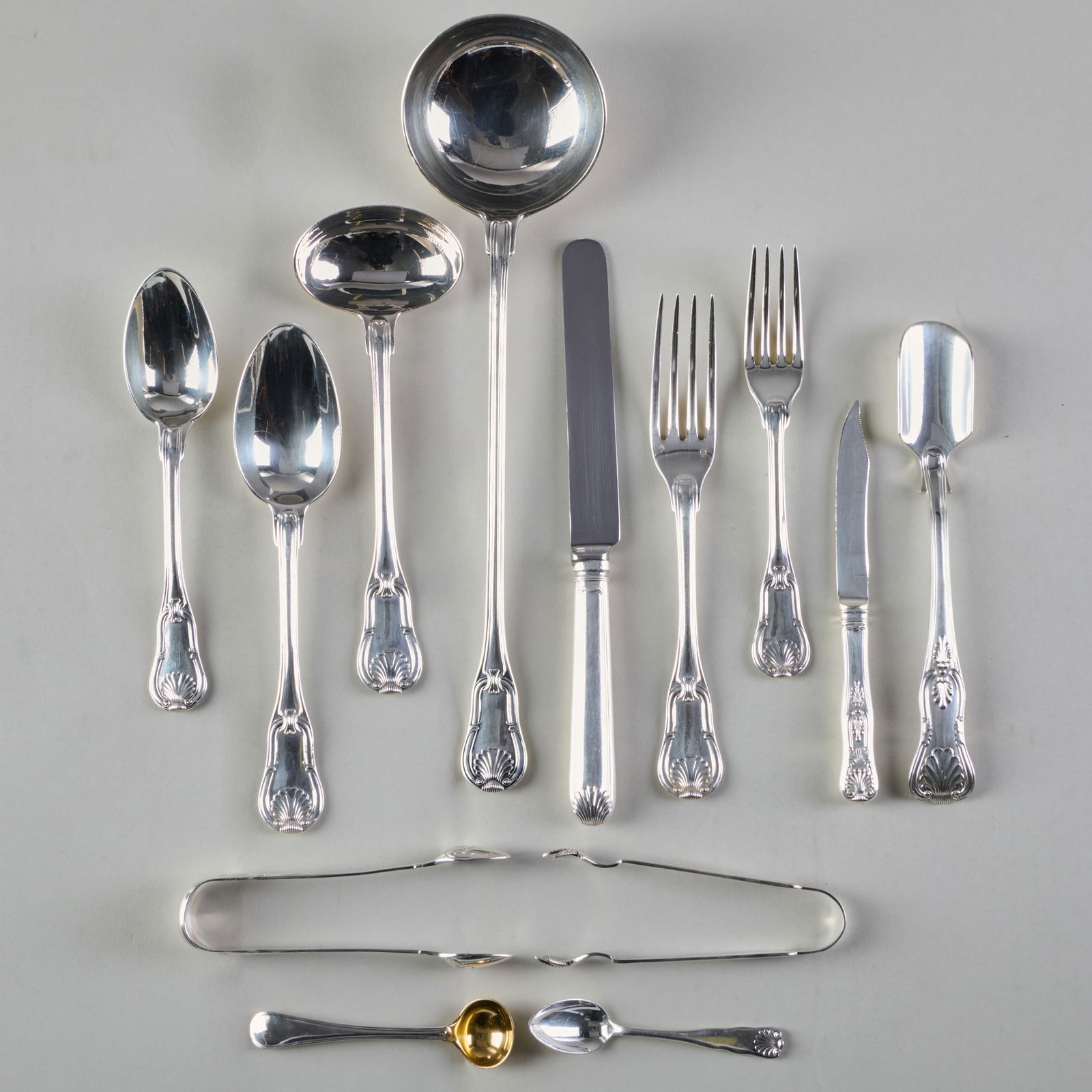 Albert Vignier & Georges Gallois Silver Flatware Service in the 'Shell' Pattern: Albert Vignier & Georges Gallois Silver Flatware Service in the 'Shell' Pattern Marked '.950' and with maker's mark, engraved with crest. Comprising: Thirty-five dinner forks Nine lunch forks Ten larg