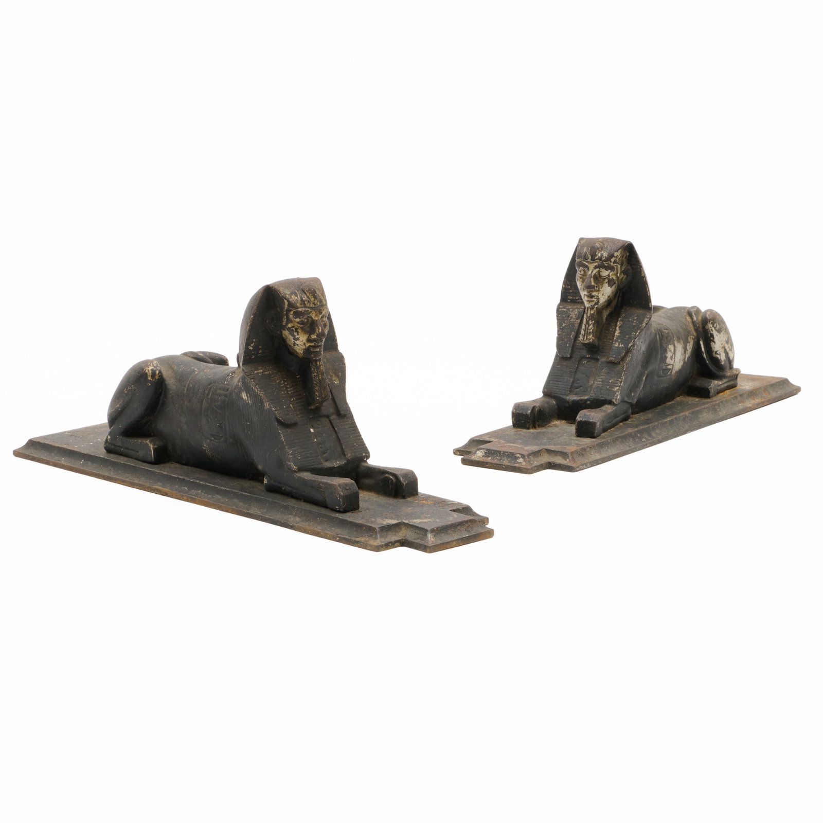 Pair of Patinated Metal Sphinxes: Pair of Patinated Metal Sphinxes