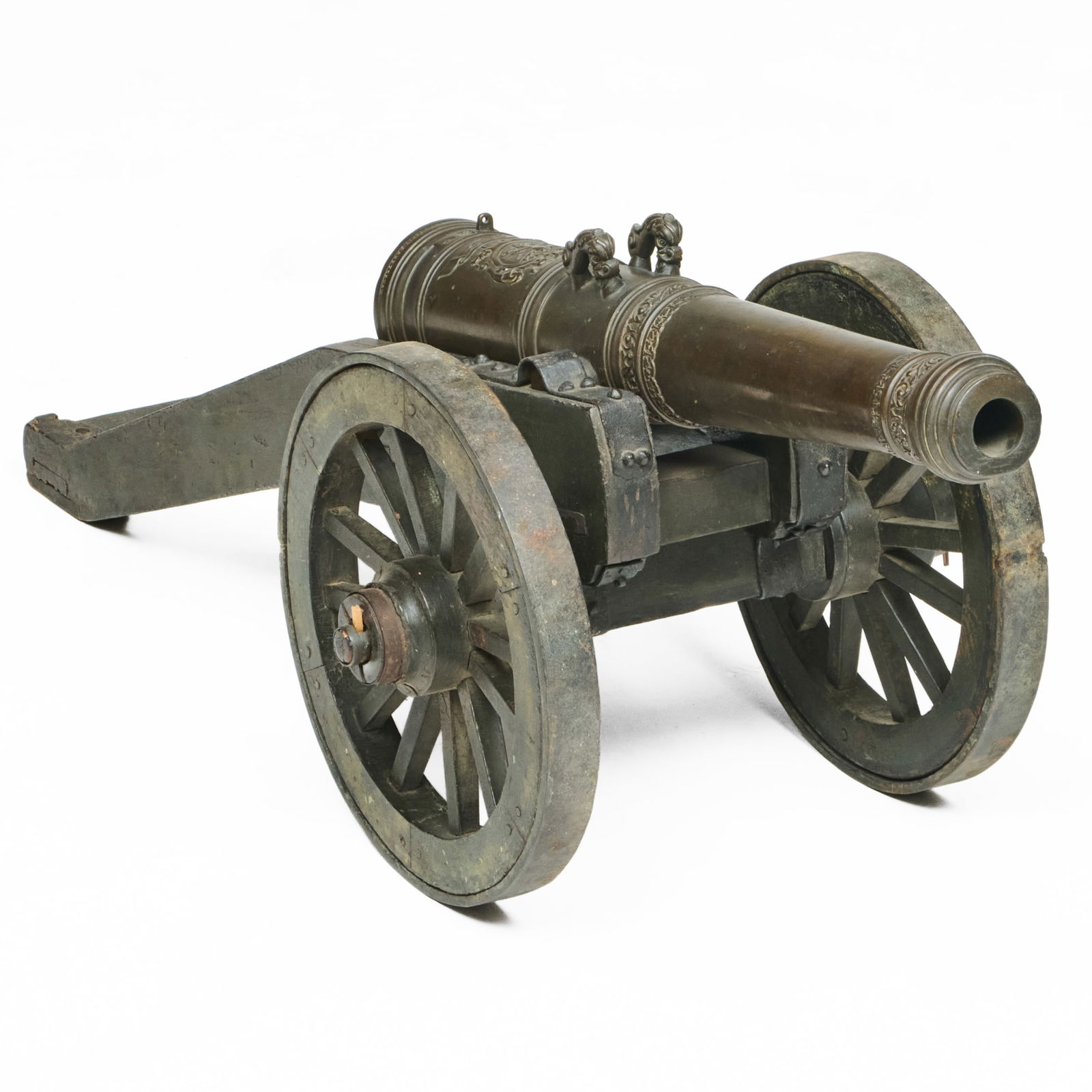 Dutch Bronze Saluting Cannon, Rotterdam: Dutch Bronze Saluting Cannon, Rotterdam Dated 1657 and inscribed SVI Cornelis Ovderogge Fecit Rotterdam, mounted on a gun carriage which is probably later in date. 13 1/2 x 39 x 16 in. Property from T