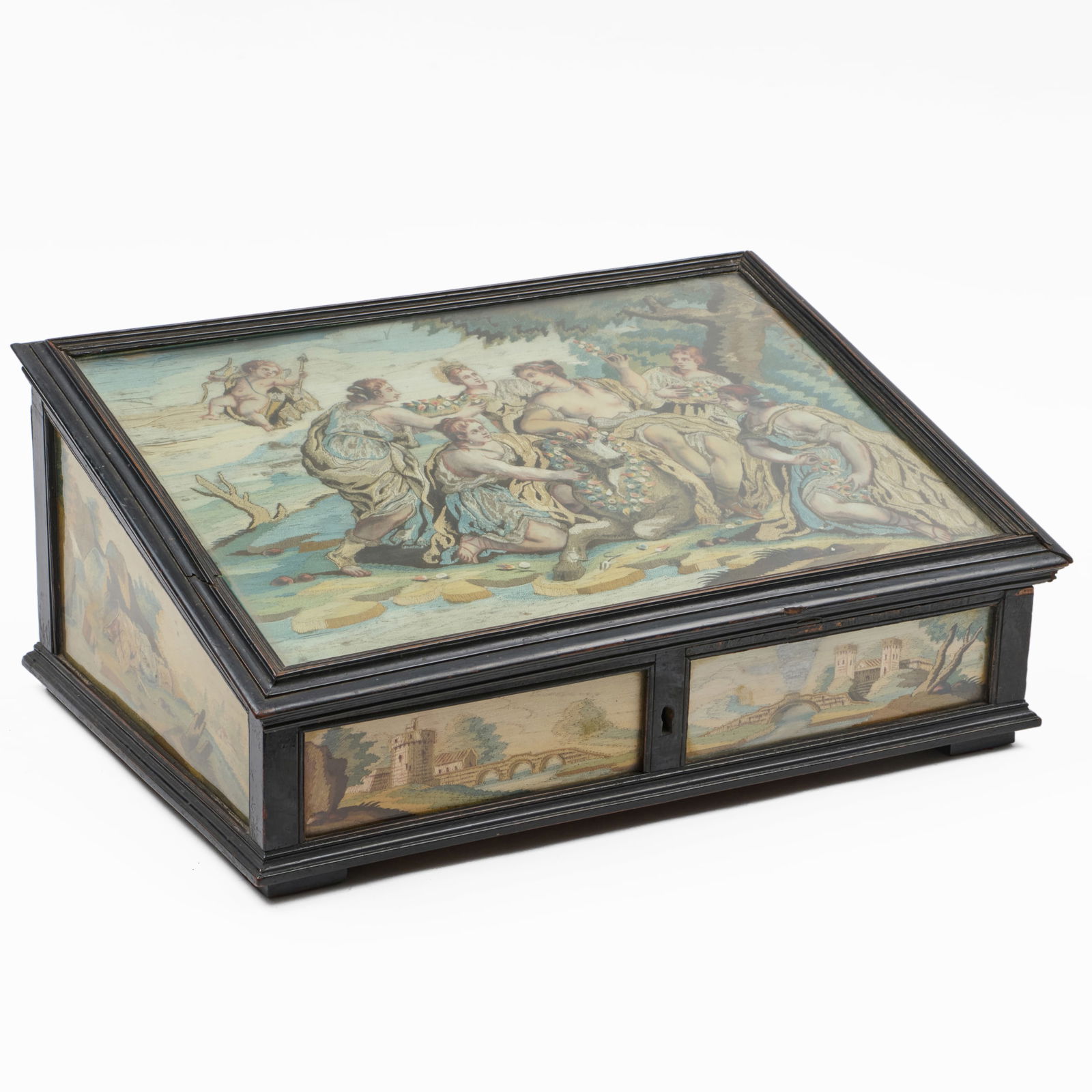 Louis XIII Silk Needlework and Watercolor Decorated Ebonized Slant-Front Box: Louis XIII Silk Needlework and Watercolor Decorated Ebonized Slant-Front BoxDepicting Europa being abducted from Phoenicia by Zeus as a bull. 9 1/4 x 21 1/2 x 14 3/4 in. Property from The Fortress in