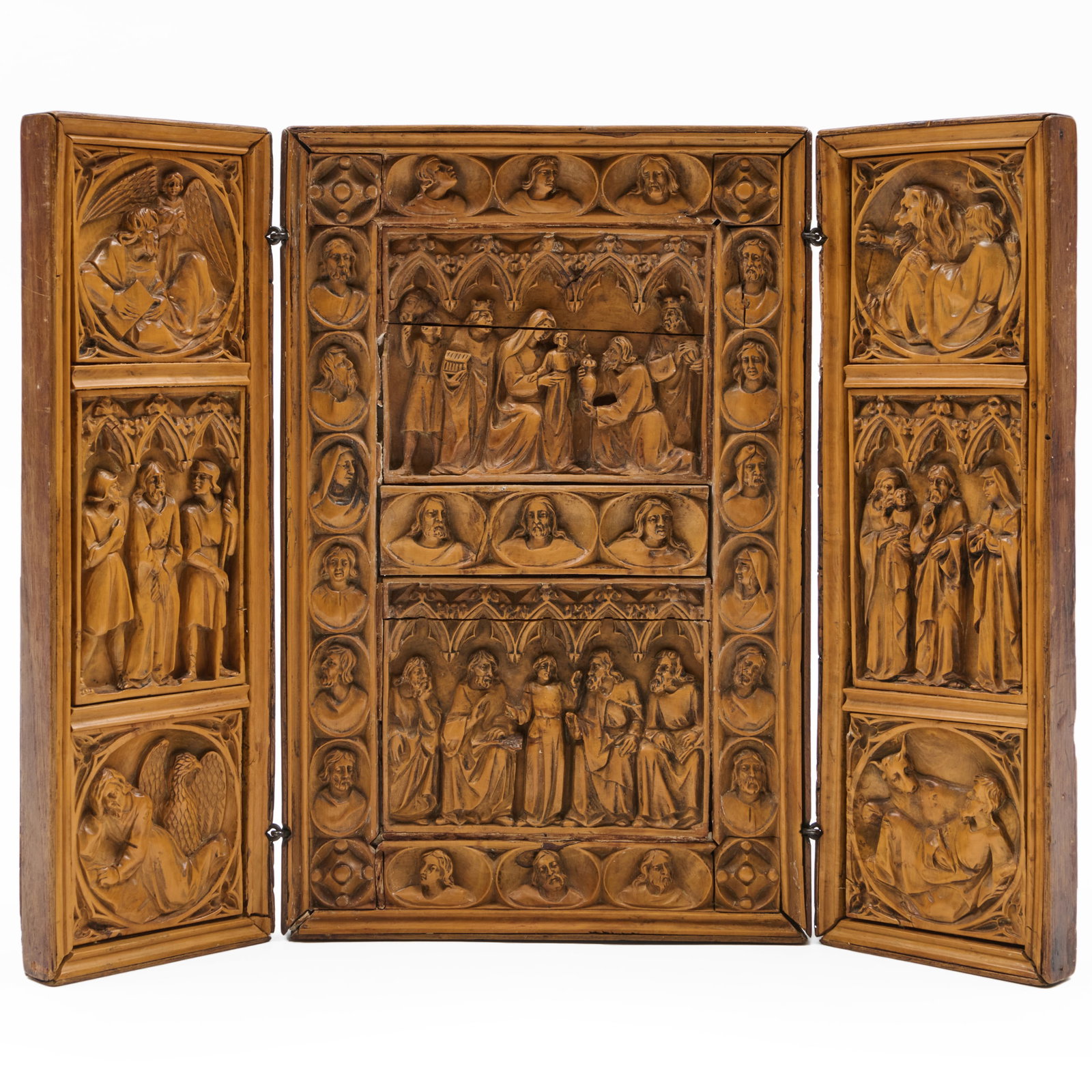 Spanish Carved Walnut and Fruitwood Triptych: Spanish Carved Walnut and Fruitwood Triptych Depicting scenes from the Life of Christ. Inscribed verso 48:12 Sp 11.3 13 x 8 1/2 x 2 in., closed. 13 x 16 3/4 x 1 1/4 in. open. The Seattle Art Museum So