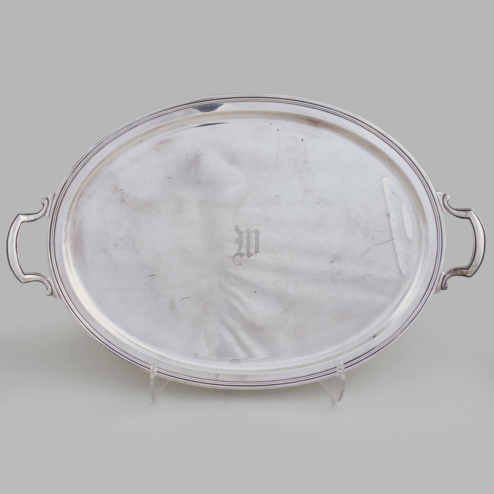 Large Tiffany & Co. Silver Two Handle Oval Monogrammed Tray: Large Tiffany & Co. Silver Two Handle Oval Monogrammed Tray Marked 'Sterling'. 18 x 28 1/2 in., 126 oz. approx. weight. Private Collection of an Atlanta Collector.