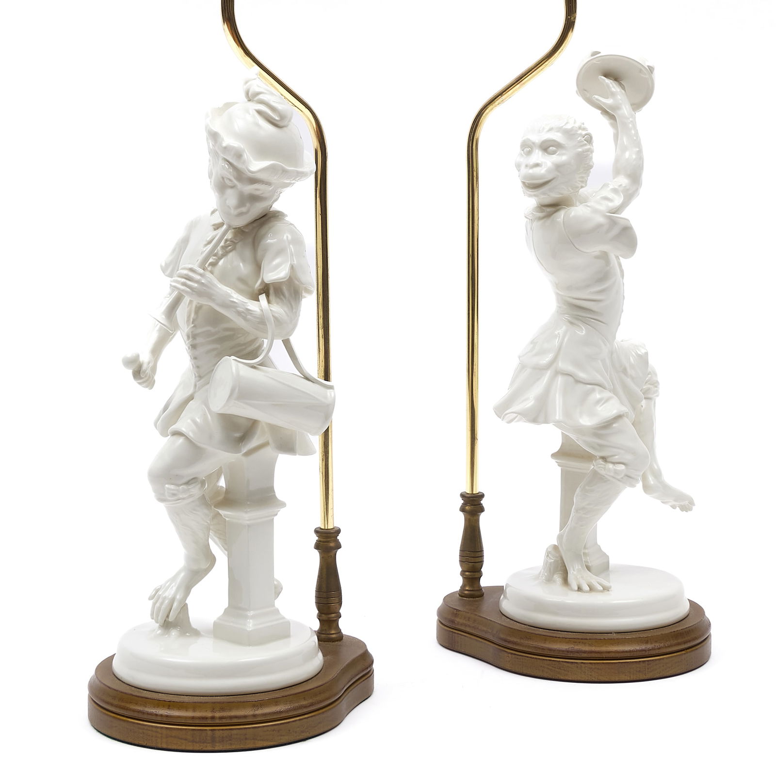 Pair of White Glazed Porcelain Models of Monkey Musicians Mounted as Lamps: Pair of White Glazed Porcelain Models of Monkey Musicians Mounted as Lamps Each approx. 21 x 7 1/2 x 6 1/2 in., (to socket). Private Collection of an Atlanta Collector.