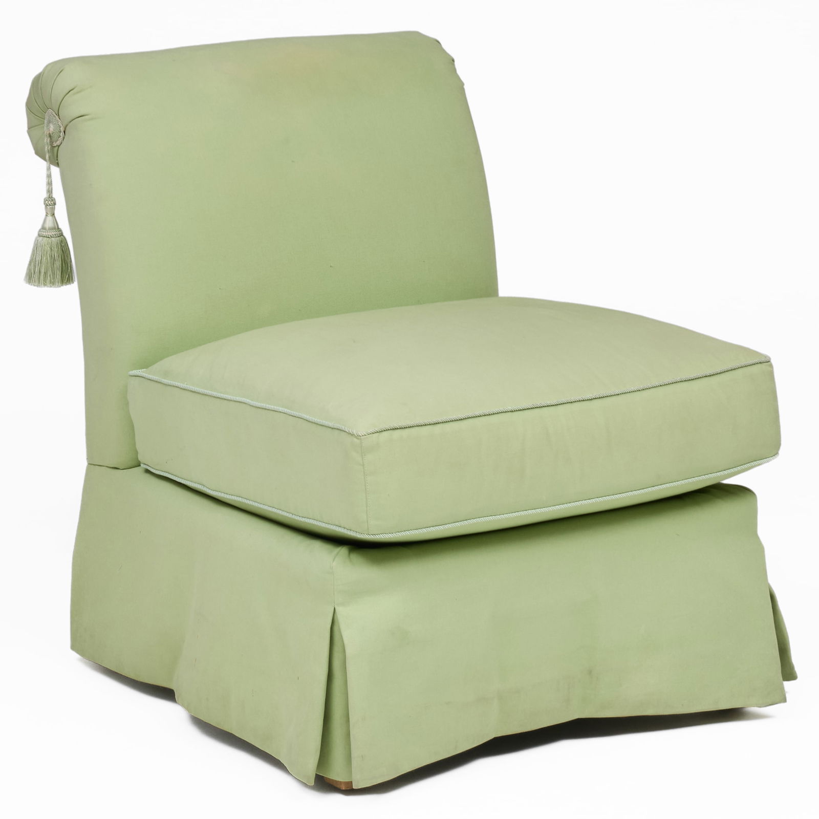 Pale Green Upholstered Slipper Chair with Tasseled Ends: Pale Green Upholstered Slipper Chair with Tasseled Ends 32 1/2 x 25 1/2 x 33 1/2 in., seat height 18 1/2 in. Private Collection of an Atlanta Collector.