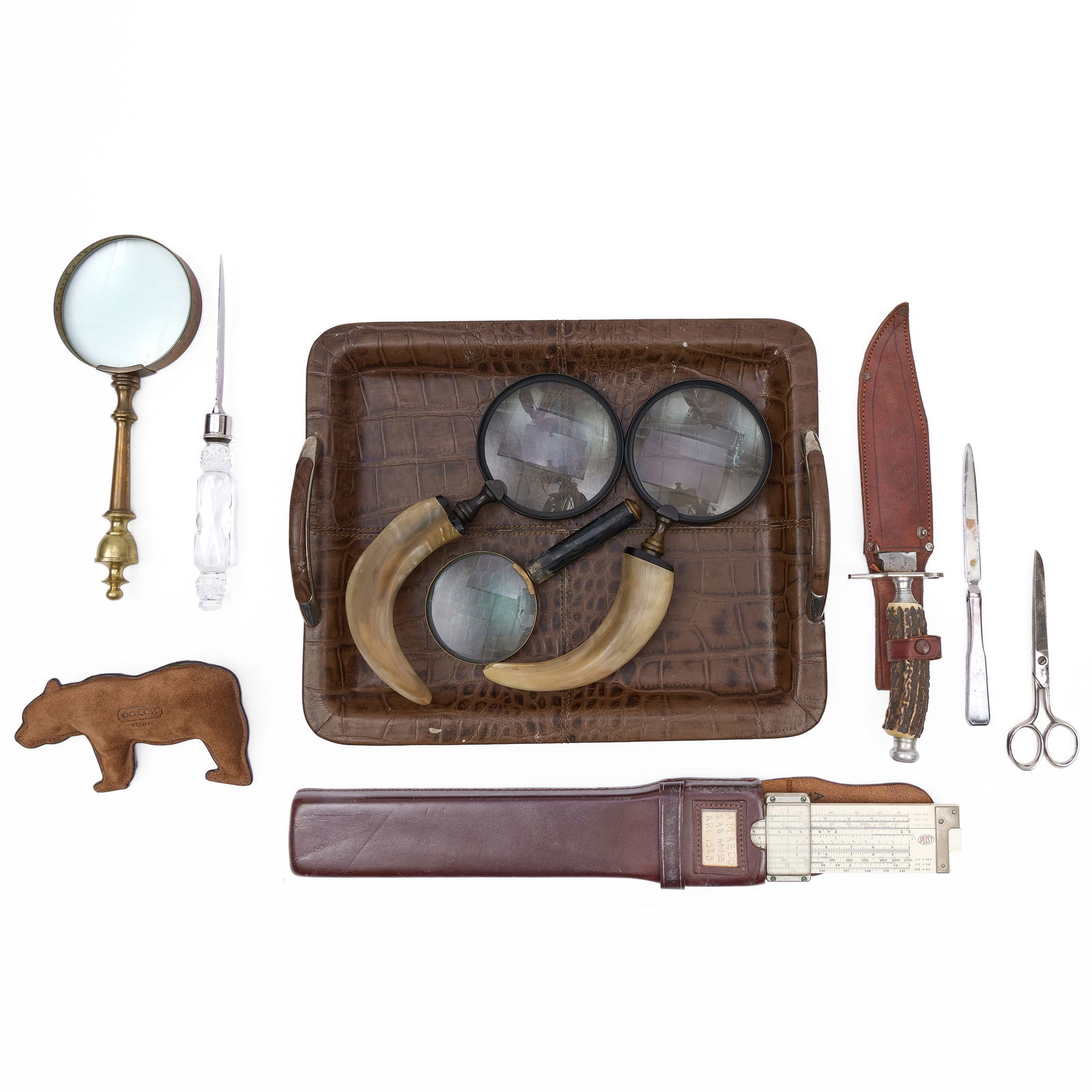 Group of Gentleman's Desk Accessories: Group of Gentleman's Desk AccessoriesComprising:A brown leather wrapped and chrome two handle tray with alligator patternA faux tortoiseshell lacquered document box and coverA Post Versalog composite