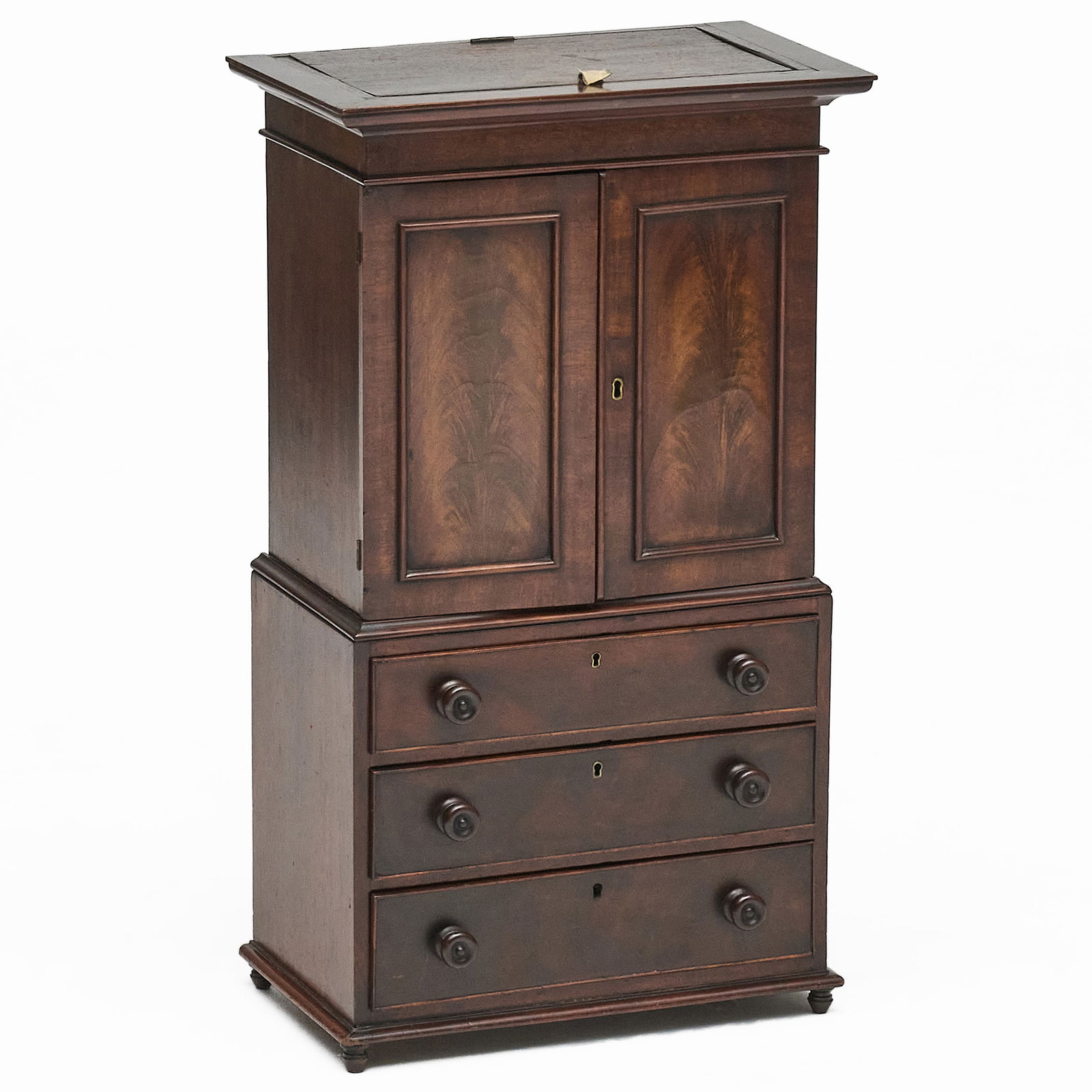 Miniature George III Mahogany Linen Press: Miniature George III Mahogany Linen Press25 1/4 x 14 x 8 1/2 in.Linlo House, Inc., New York (dealer's card inside).Property from the Collection of a Prominent Long Island Family.