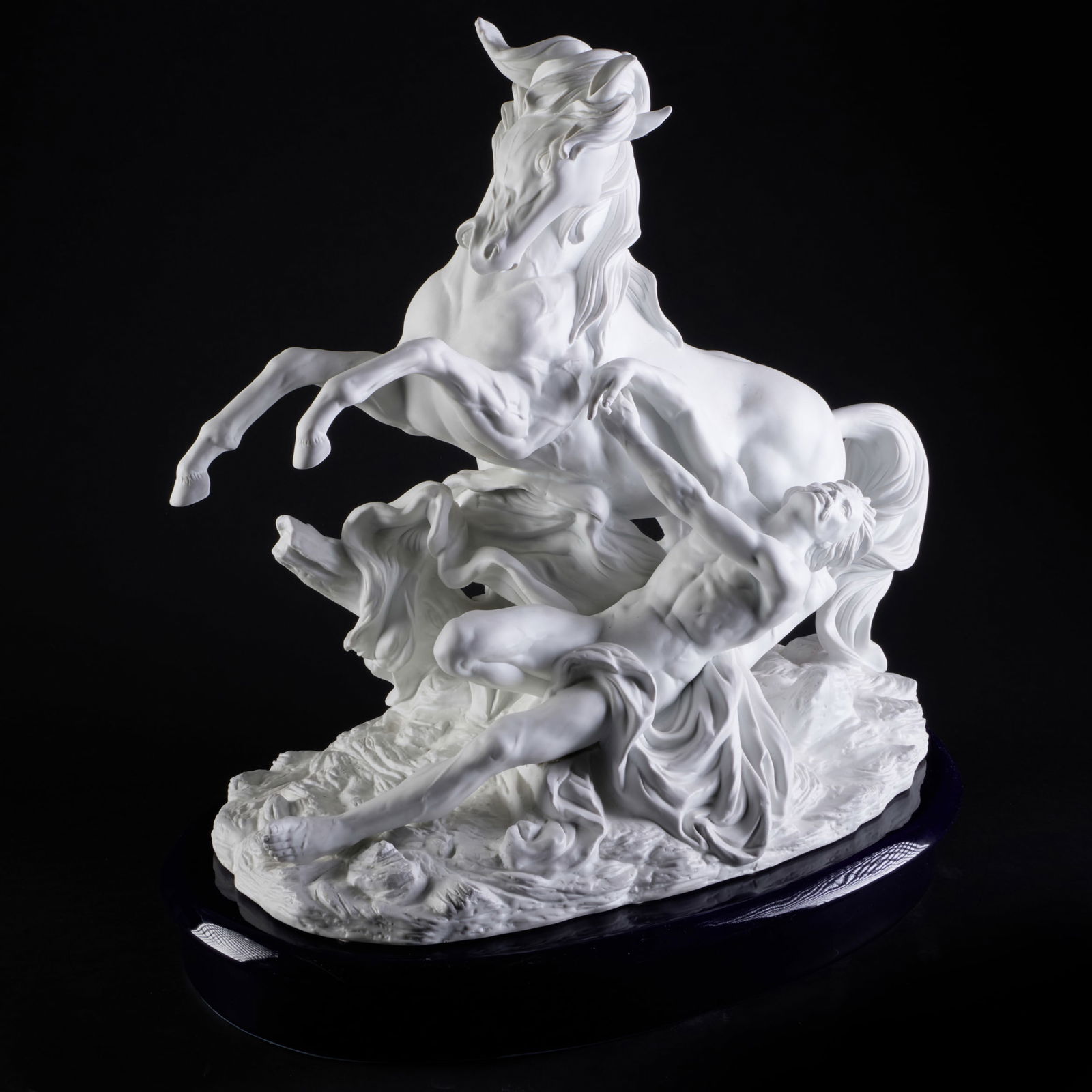 Parian Porcelain Model of a Marly Horse on a Cobalt Glazed Porcelain Base: Parian Porcelain Model of a Marly Horse on a Cobalt Glazed Porcelain Base Blue crossed line mark. 23 x 22 x 12 in. (overall). Sold STAIR, December 11, 2025, lot 353.