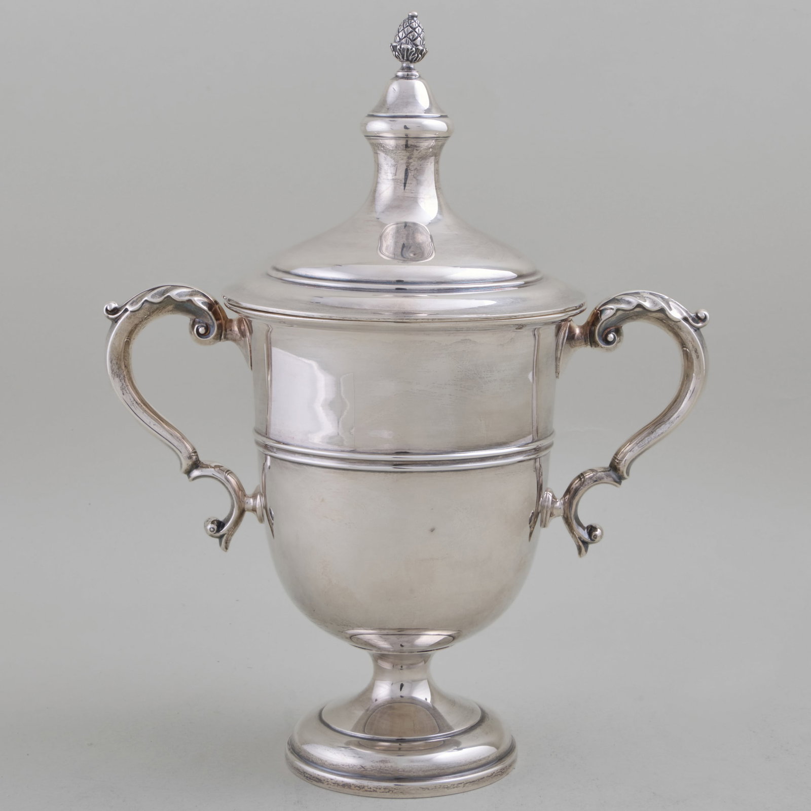 George V Silver Two Handle Cup and Cover: George V Silver Two Handle Cup and CoverMarked Crichton Bros. London, 1922.12 x 9 x 5 1/2 in., 24.6 oz. approx. weight.