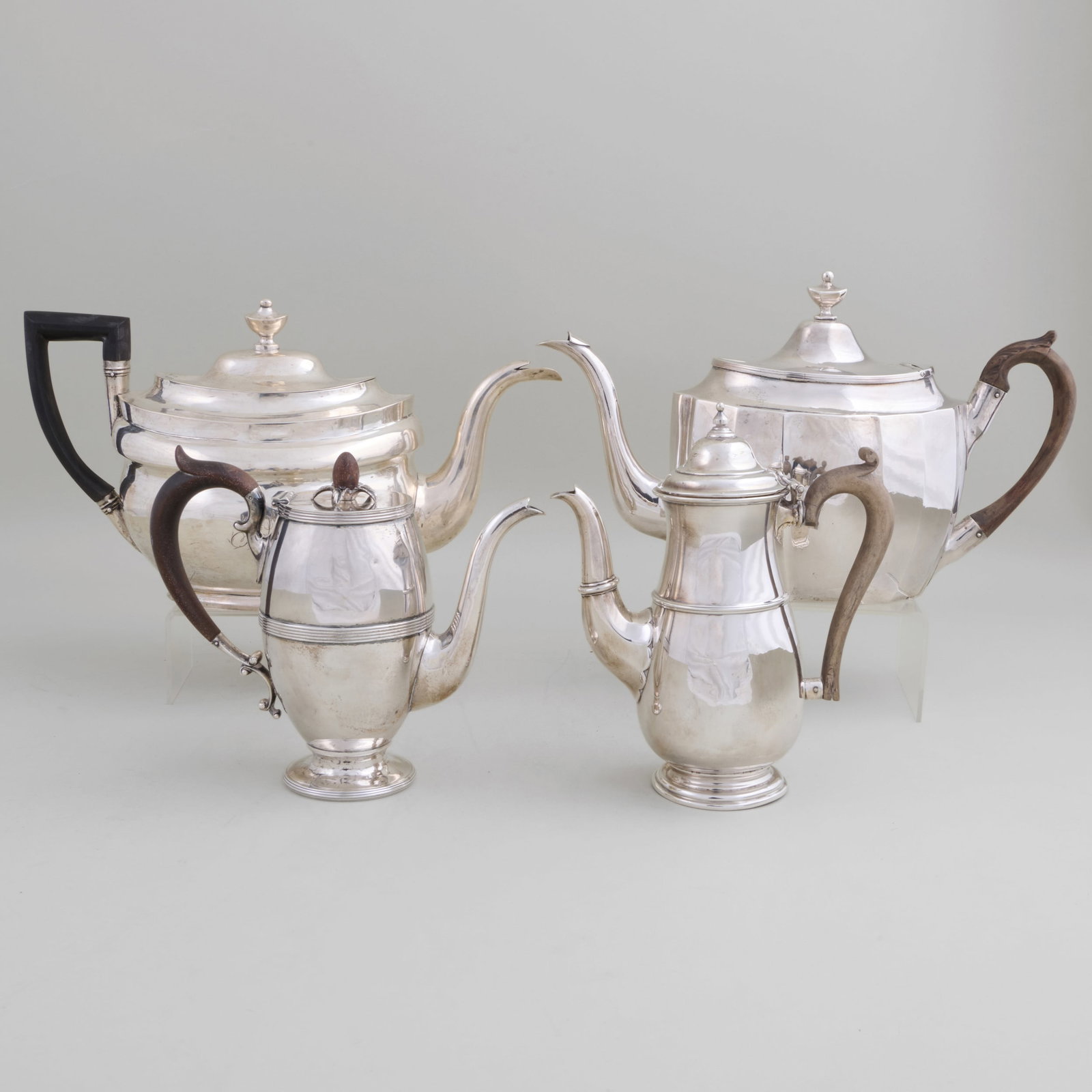 Three American Silver and a George V Silver Teawares: Three American Silver and a George V Silver TeawaresComprising:An American coin silver teapot with hinged cover, maker's mark indistinctA Hugh Wishart, New York, teapot with hinged cover, maker's