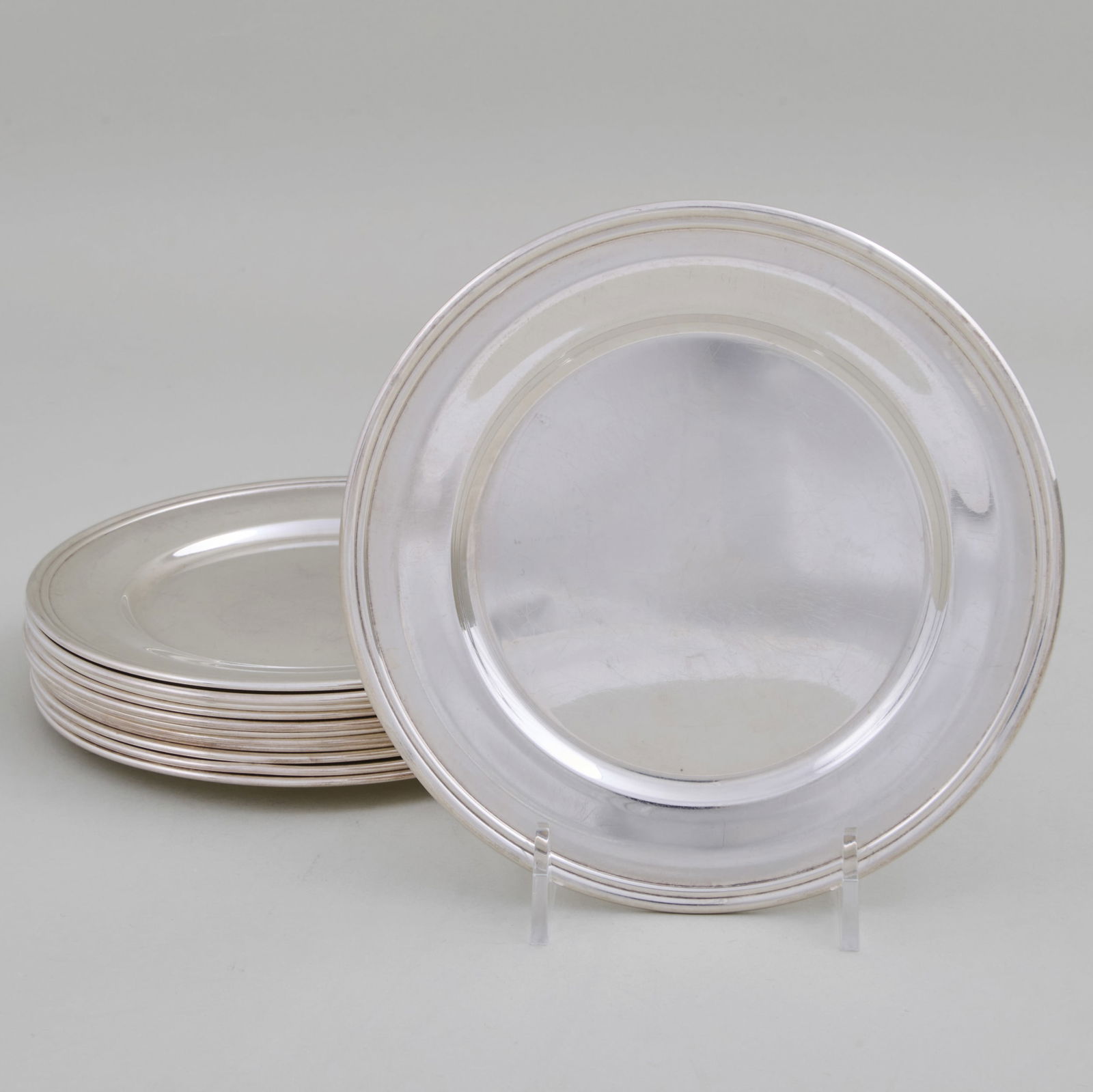 Set of Twelve Kirk & Son Silver Side Plates: Set of Twelve Kirk & Son Silver Side PlatesMarked 'Sterling'.6 in. diam., 38.3 oz. approx. weight.