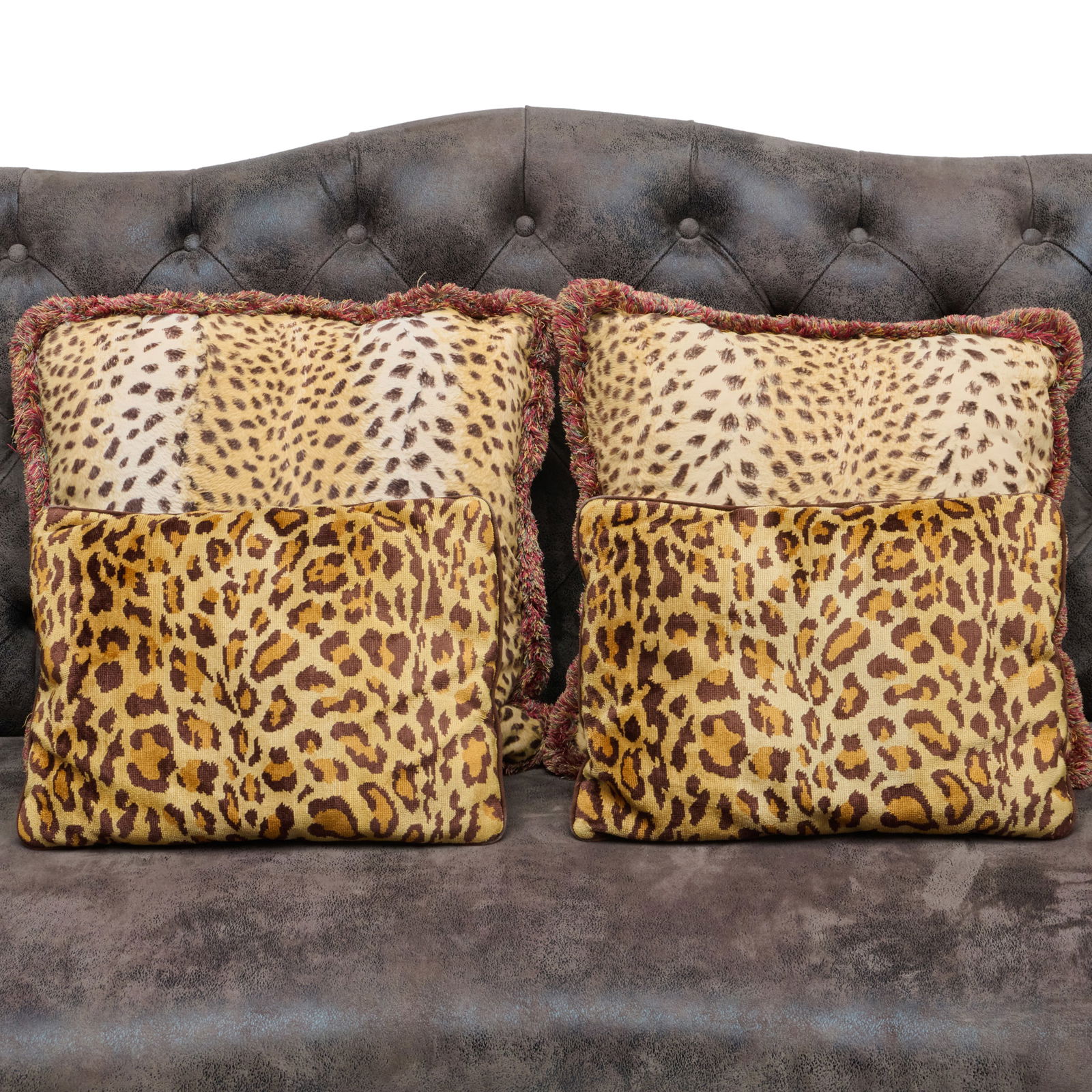 Group of Four Leopard Print Throw Pillows: Group of Four Leopard Print Throw PillowsThe largest approximately 19 x 19 in. Collection of Lynn Chase from Money Pit Farm.