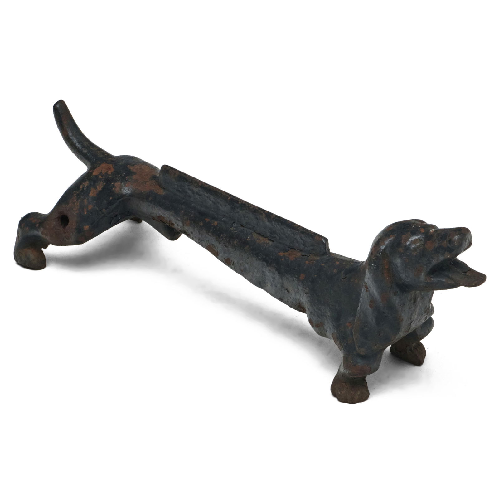 Iron Dachschund Form Boot Scraper: Iron Dachschund Form Boot Scraper 8 x 23 x 7 in. Collection of Lynn Chase from Money Pit Farm.