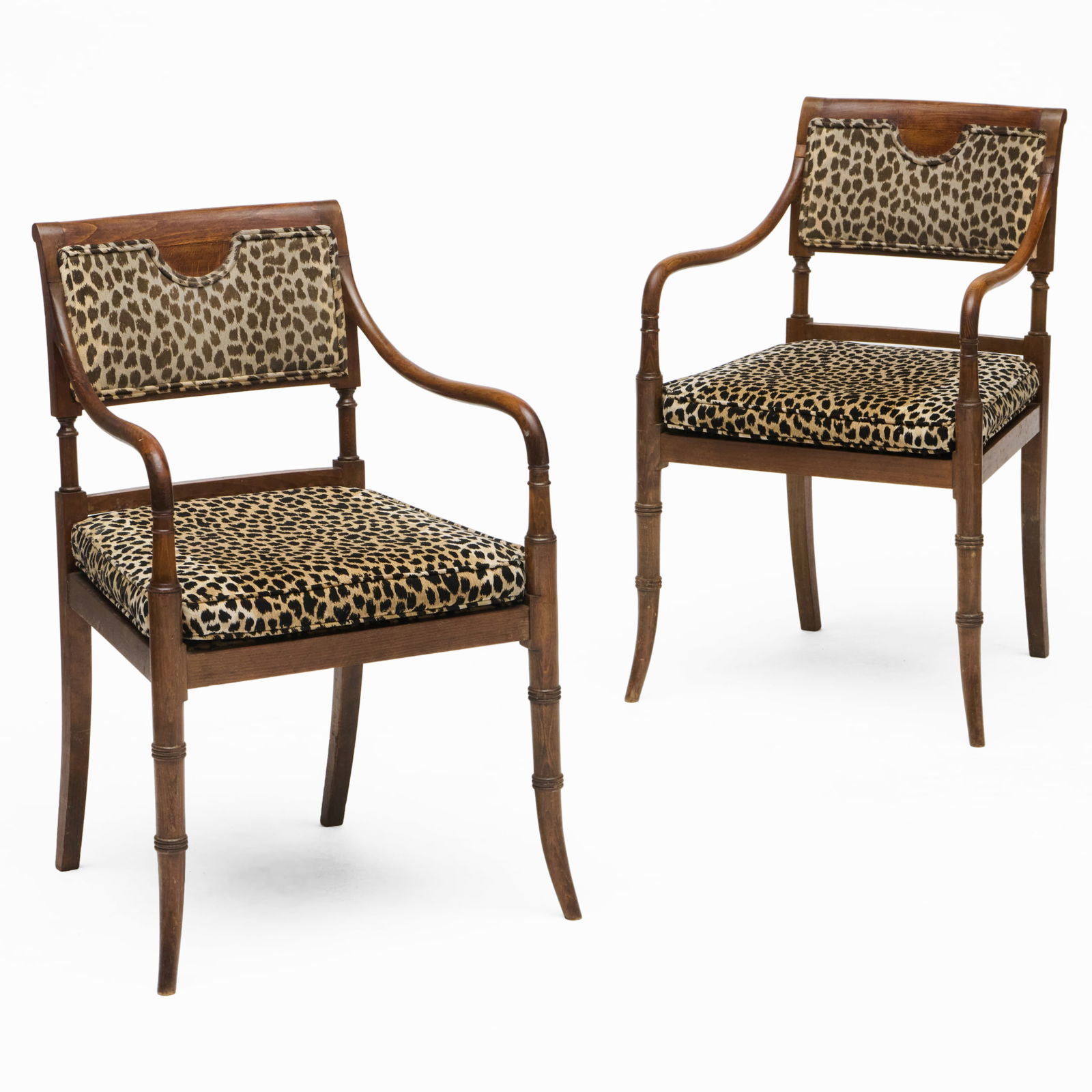Pair of Leopard Upholstered Oak Side Chairs: Pair of Leopard Upholstered Oak Side Chairs32 1/2 x 20 1/2 x 21 in., seat height 17 1/2 in. Collection of Lynn Chase from Money Pit Farm.