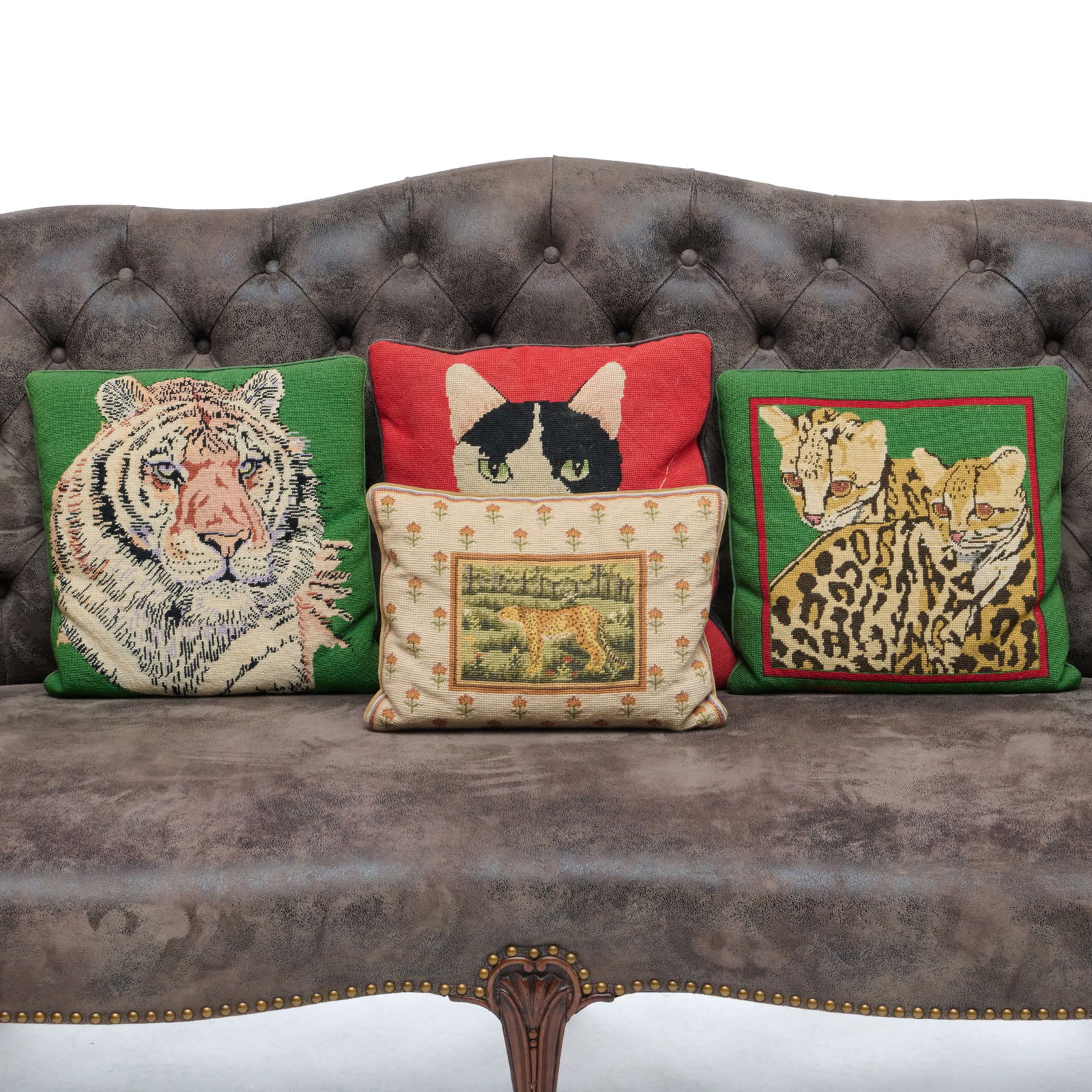 Group of Four Needlepoint Throw Pillows with Cats: Group of Four Needlepoint Throw Pillows with Cats The largest approximately 15 x 15 in. Collection of Lynn Chase from Money Pit Farm.