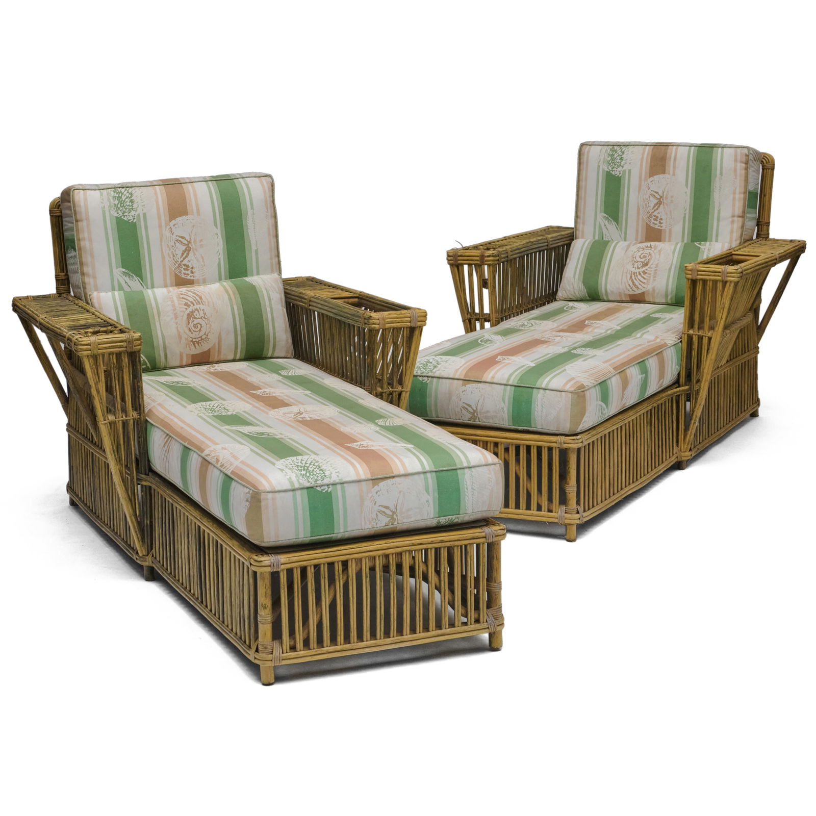 Pair of Rattan Chaises: Pair of Rattan ChaisesMarked Bielecky Brothers, Inc. NY.34 1/2 x 37 x 5 ft. 7 in., seat height 17 1/2 in.Collection of Lynn Chase from Money Pit Farm.