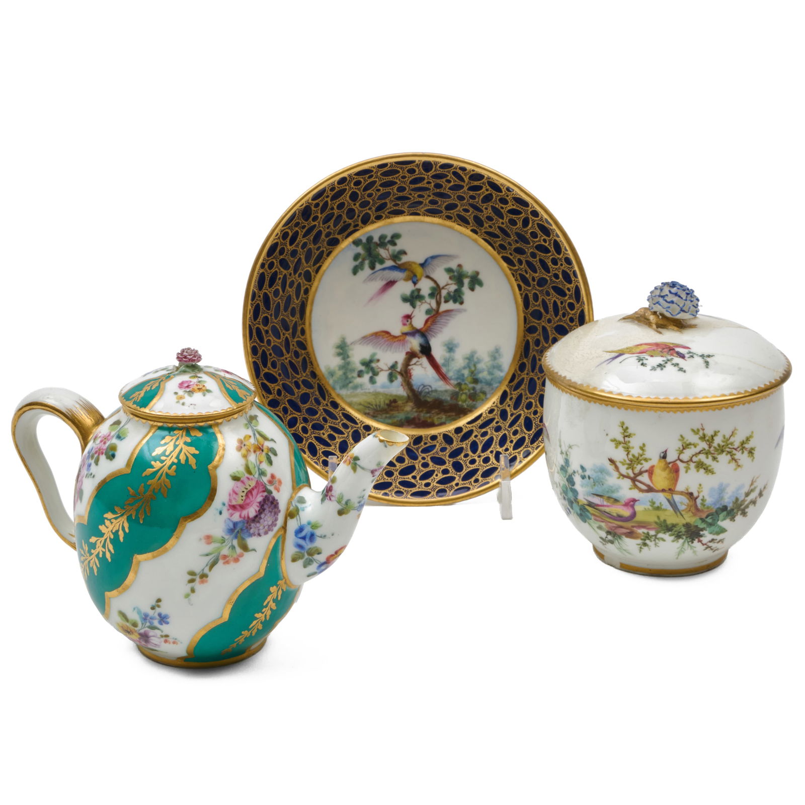 Small Sevres Teapot and Cover, a Saucer, and a Sugar Bowl and Cover: Small Sevres Teapot and Cover, a Saucer, and a Sugar Bowl and CoverBlue painted interlaced L marks.The teapot 4 x 6 x 3 in.Collection of Lynn Chase from Money Pit Farm.