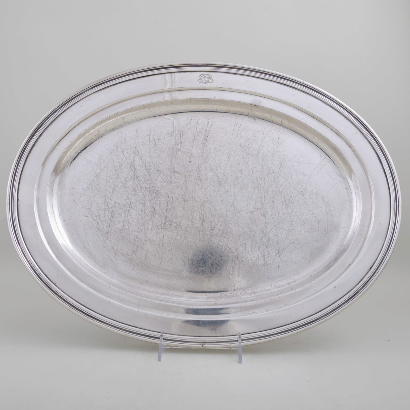 Tiffany & Co. Silver Oval Meat Platter: Tiffany & Co. Silver Oval Meat PlatterMarked 'Sterling', monogrammed.14 1/2 x 19 3/4 in., 63.8 oz. approx. weight.Collection of Lynn Chase from Money Pit Farm.