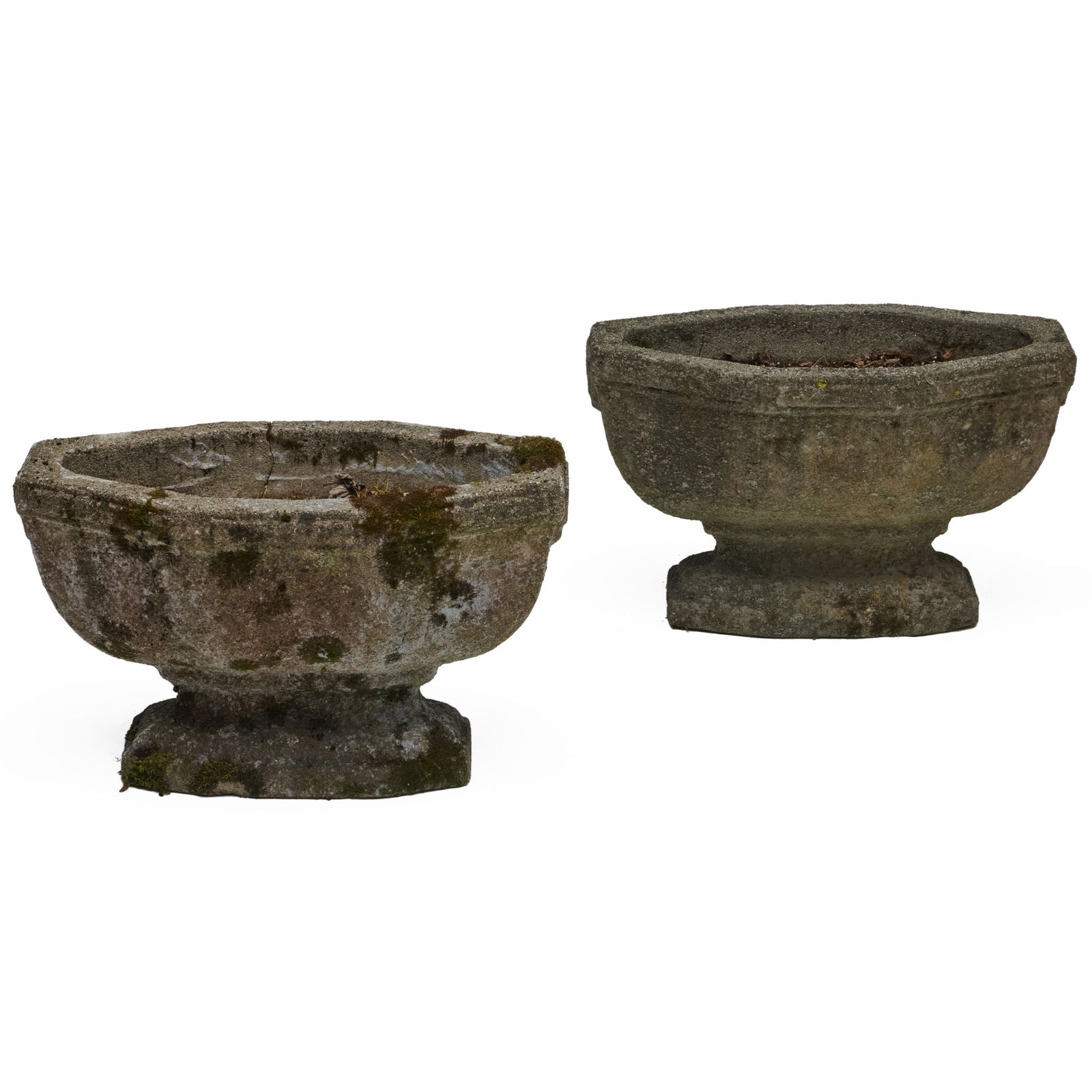 Pair of Cast Stone Jardineres: Pair of Cast Stone Jardineres15 x 24 x 12 1/4 in. Collection of Lynn Chase from Money Pit Farm.