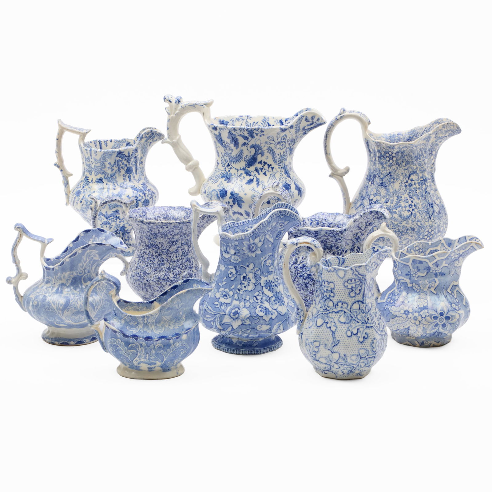 Group of Ten Victorian Blue and White Transfer Printed 'Chintz' Jugs of Various Size (1 of 20)