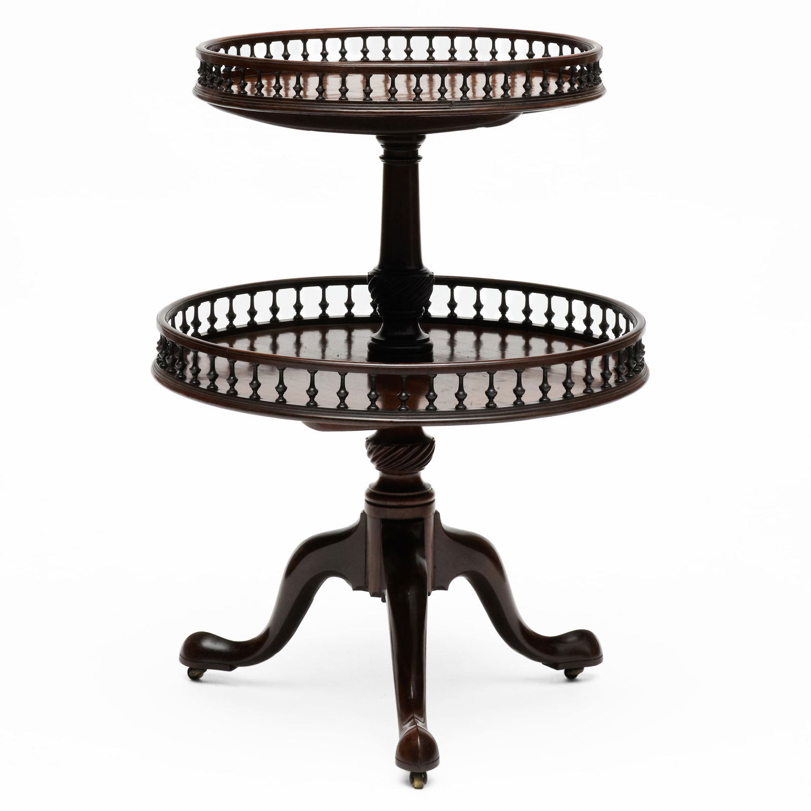George III Mahogany Two-Tier Dumbwaiter: George III Mahogany Two-Tier Dumbwaiter Raised on casters which are of a later date, with a revolving top. 35 x 26 in. diam. Sold STAIR, October 30, 2025, lot 506.