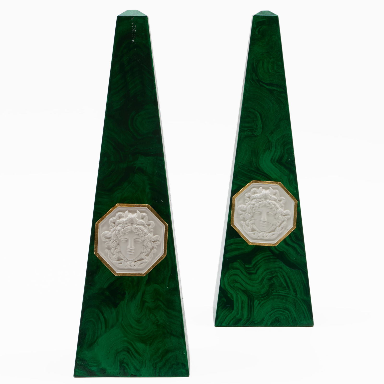 Pair of Faux Malachite Obelisks: Pair of Faux Malachite Obelisks With portraits of Medusa. 16 1/2 x 5 x 5 in.