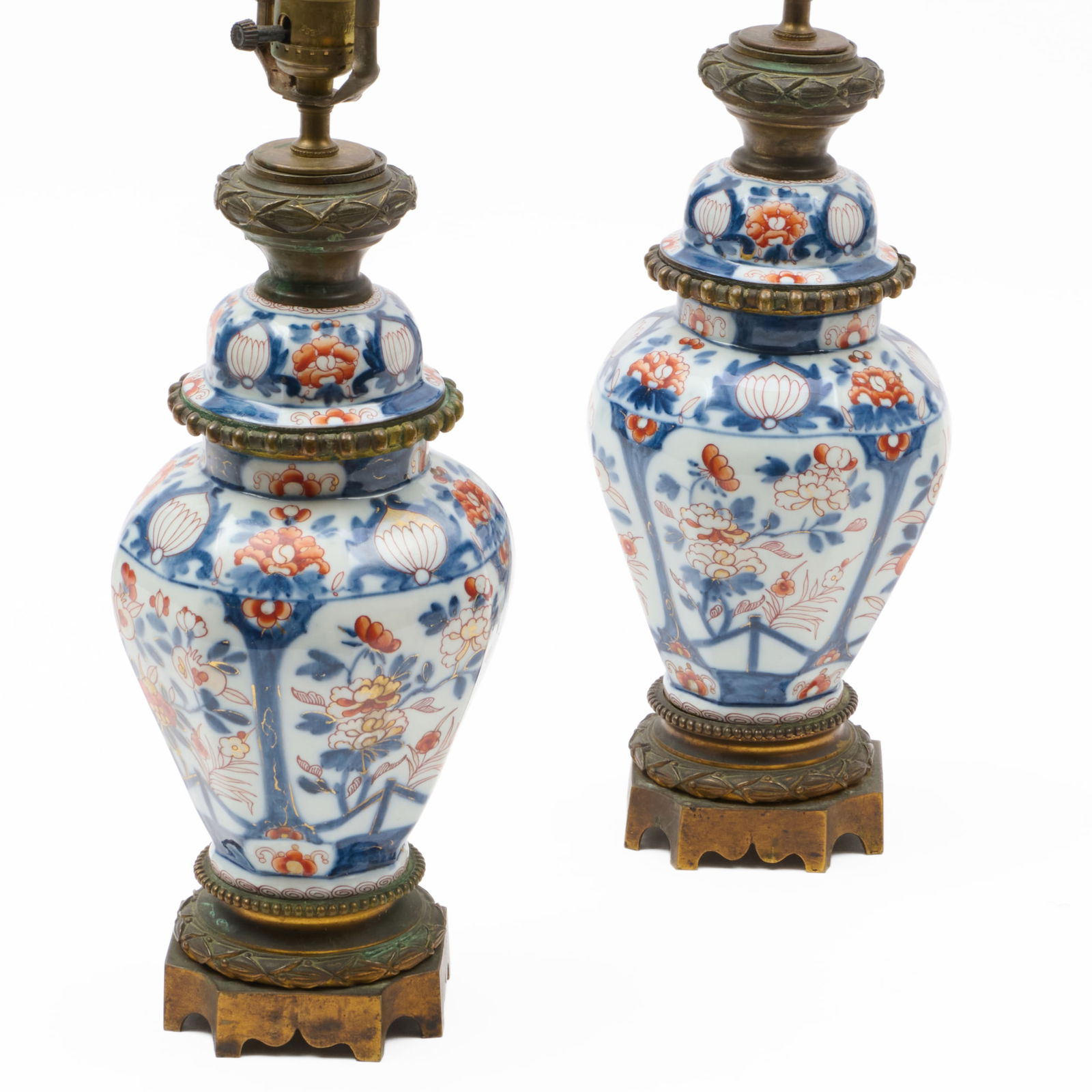 Pair of Japanese Imari Porcelain Fluid Lamps: Pair of Japanese Imari Porcelain Fluid Lamps 18 x 6 x 6 in. The Collection of James M. Labaugh Antiques, Pound Ridge, NY.